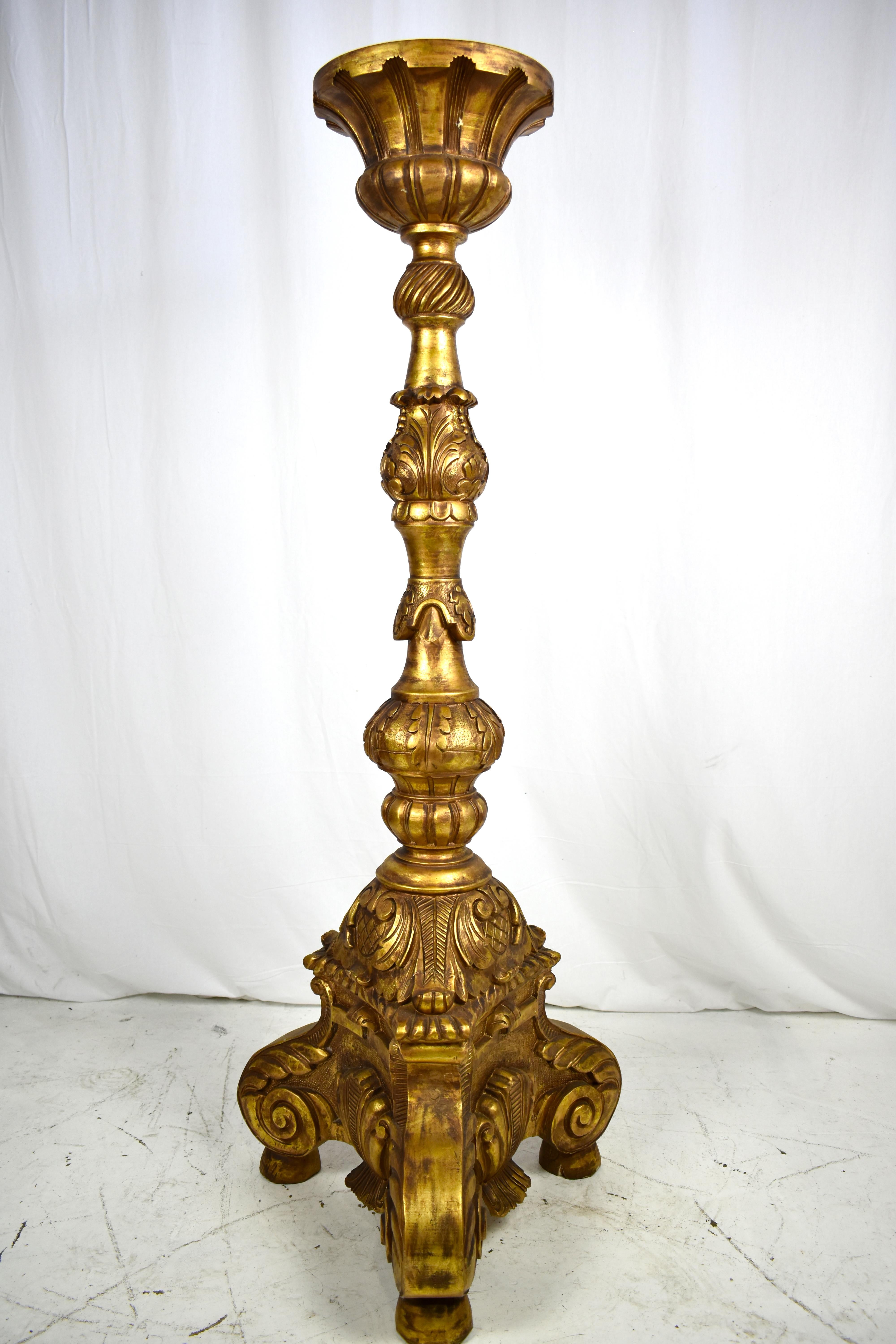 A large pair of continental carved, gilt Torchers, 20th century.
Height 60'' Width21''