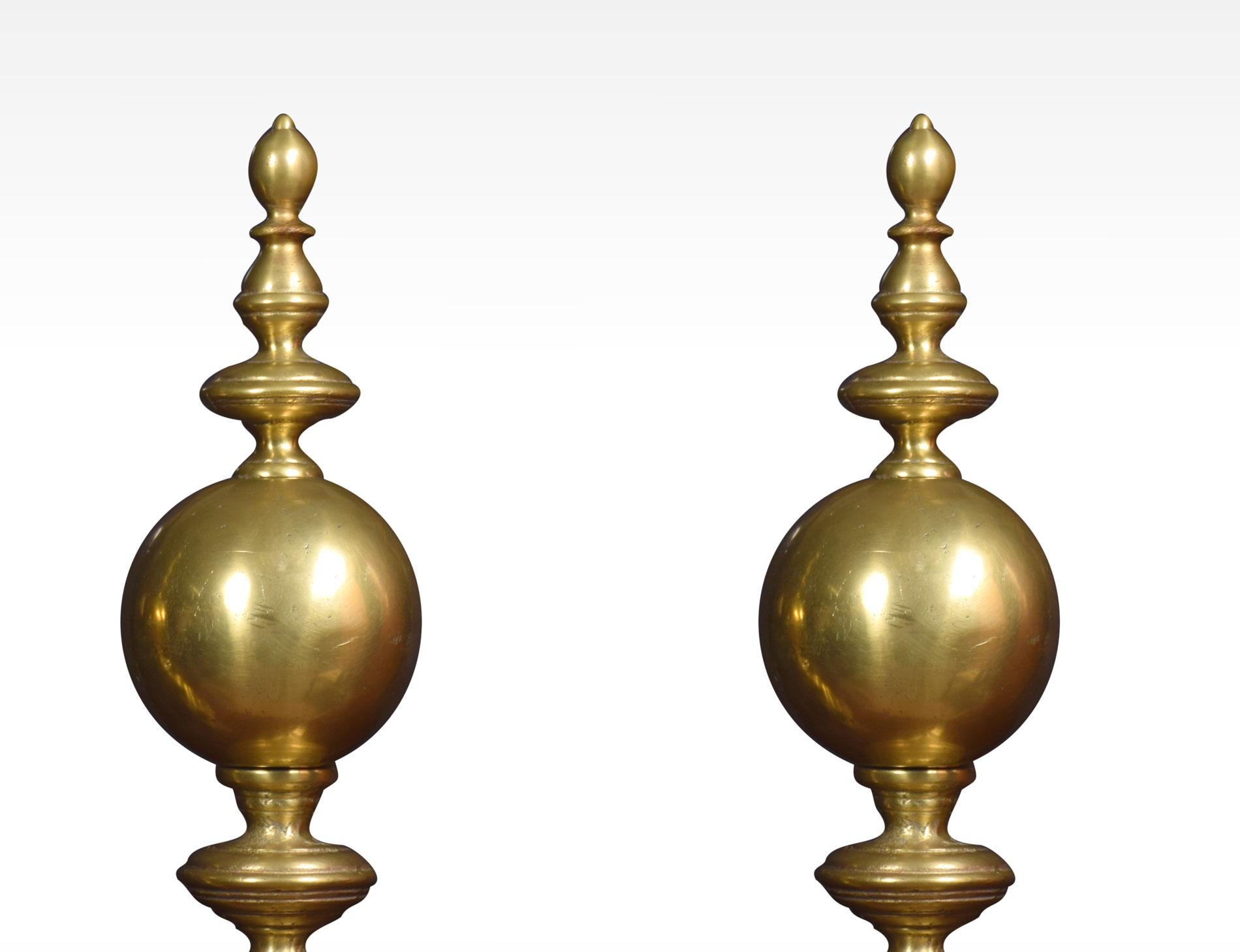 Pair of Dutch Baroque style brass fire dogs the ball uprights with finials on bases cast with flowerheads terminating in block feet.
Dimensions:
Height 20 inches
Width 7 inches
Depth 14.5 inches.