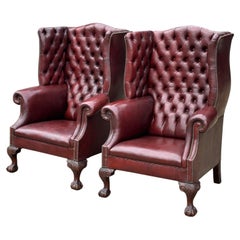 Large Pair of Early 20th Century Full Buttoned Burgundy Leather Wing Armchairs