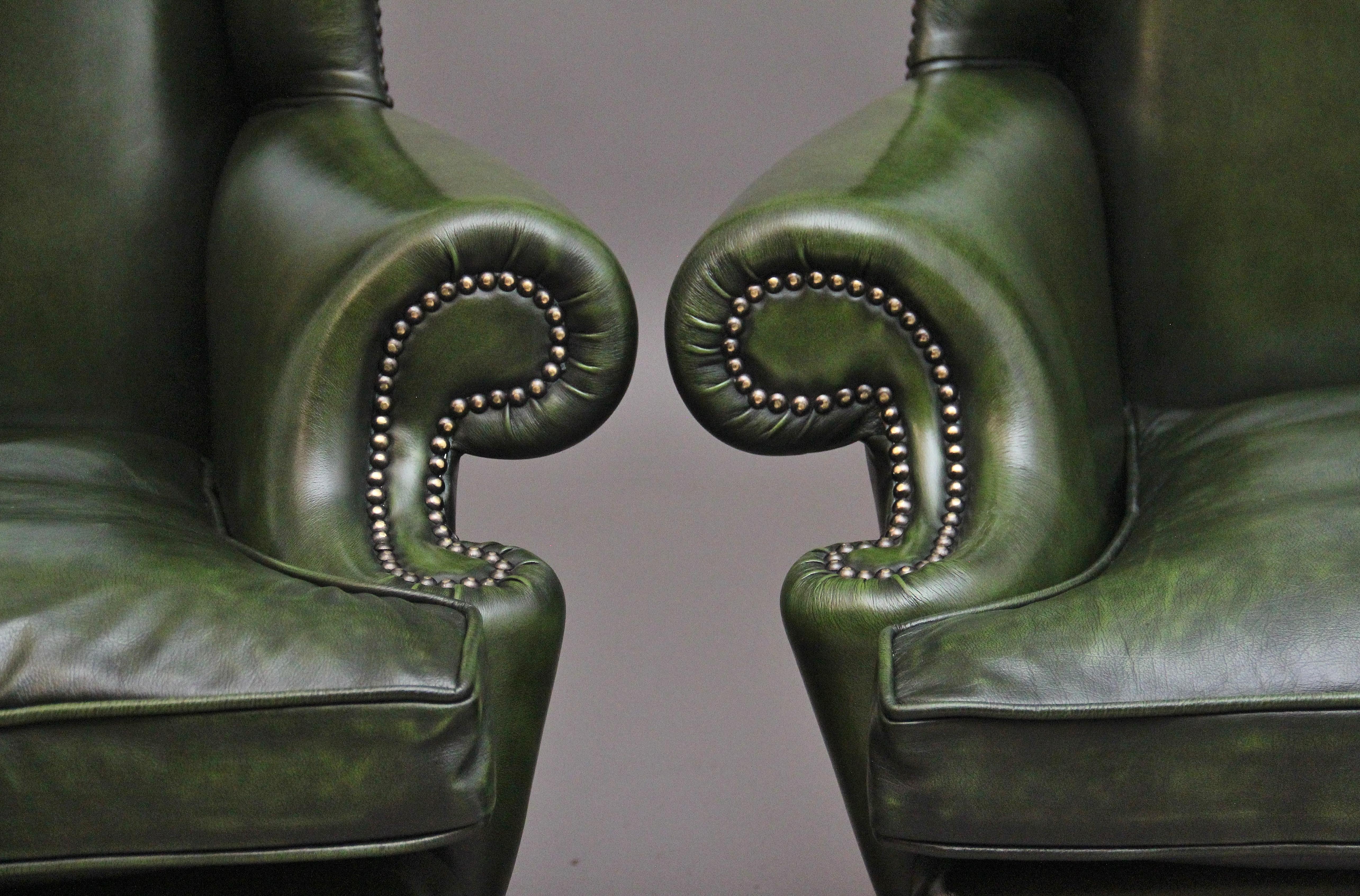 Leather Large pair of early 20th Century walnut wingback armchairs For Sale