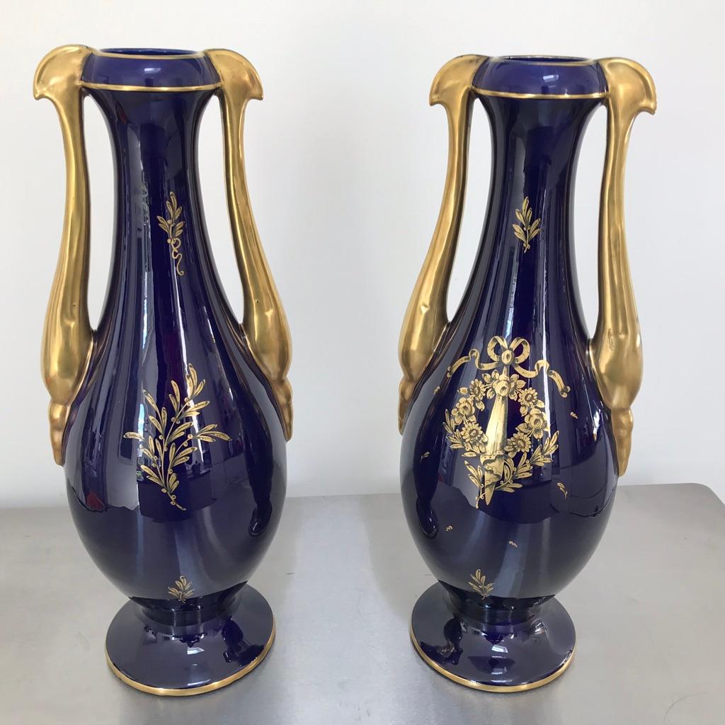 Large and impressive pair of French early 20th century cobalt blue and heavily gilded twin handled vases by J&P of France, circa 1920.
Very decorative pair and very elegant too, fabulous shape to them and beautifully gilded.
The condition is good