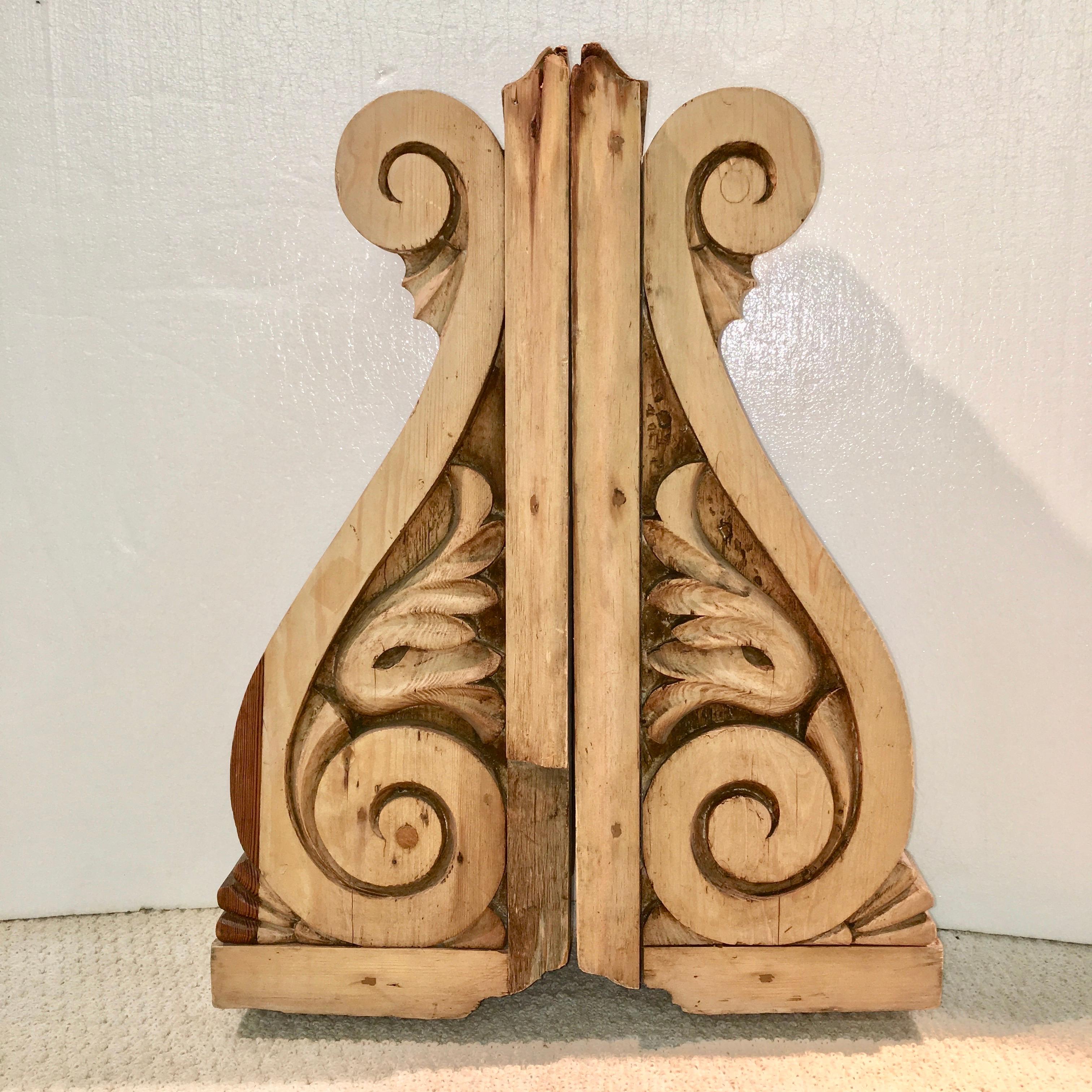 Pair of very attractive antique corbel brackets, hand carved, bleached pine, English, last quarter of 19th century. One has two handsome old repairs which appear to have been made with oak. 
Both tops have a square block 4