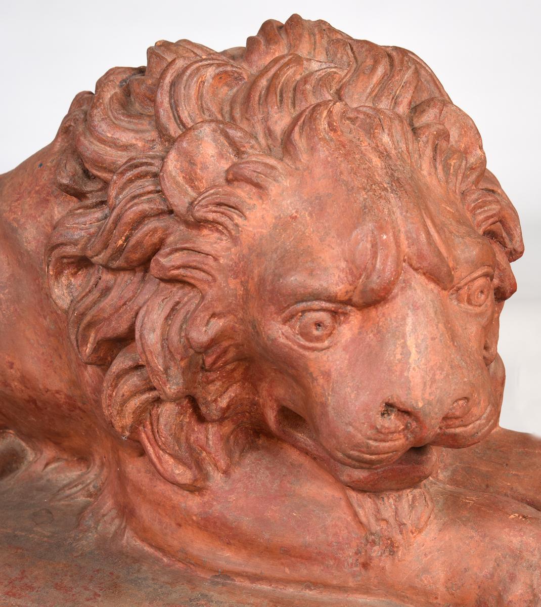 Neoclassical Large Pair of English Terracotta Recumbent Lions on Later Bases, circa 1830 For Sale