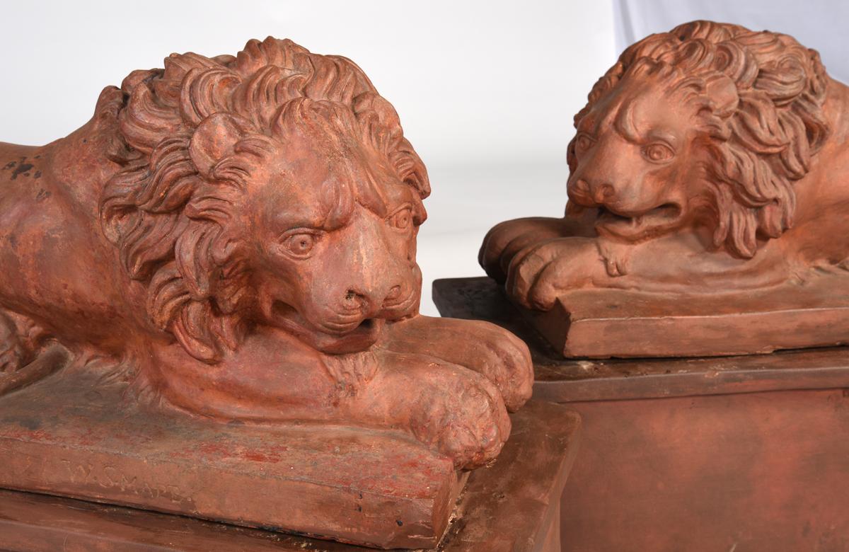 Large Pair of English Terracotta Recumbent Lions on Later Bases, circa 1830 In Good Condition For Sale In Barrington, IL