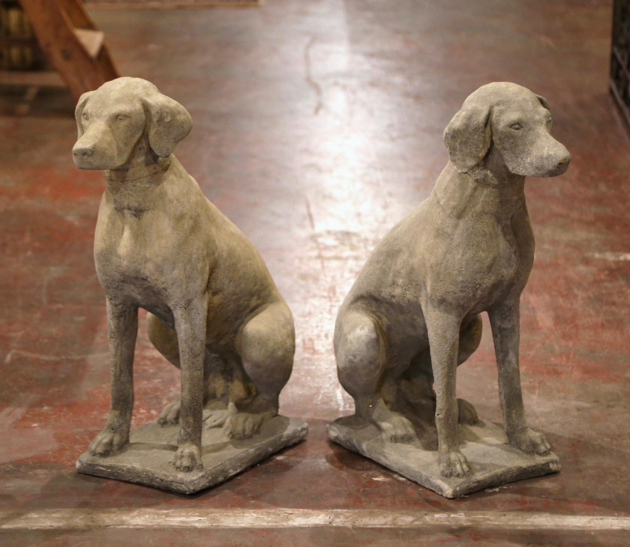 stone doberman statue