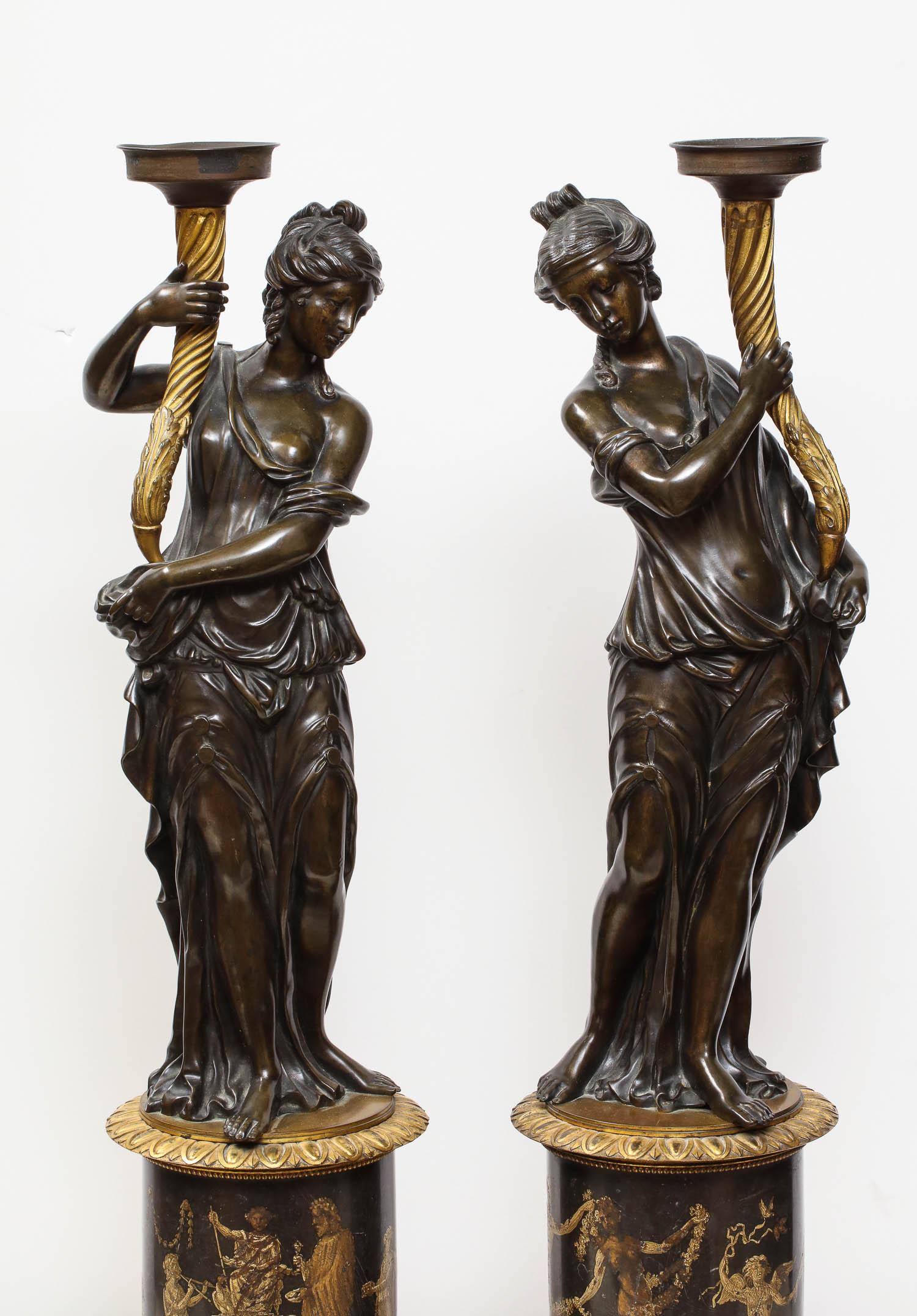 Regency Large Pair of French Gilt and Patinated Bronze Figural Candleholders