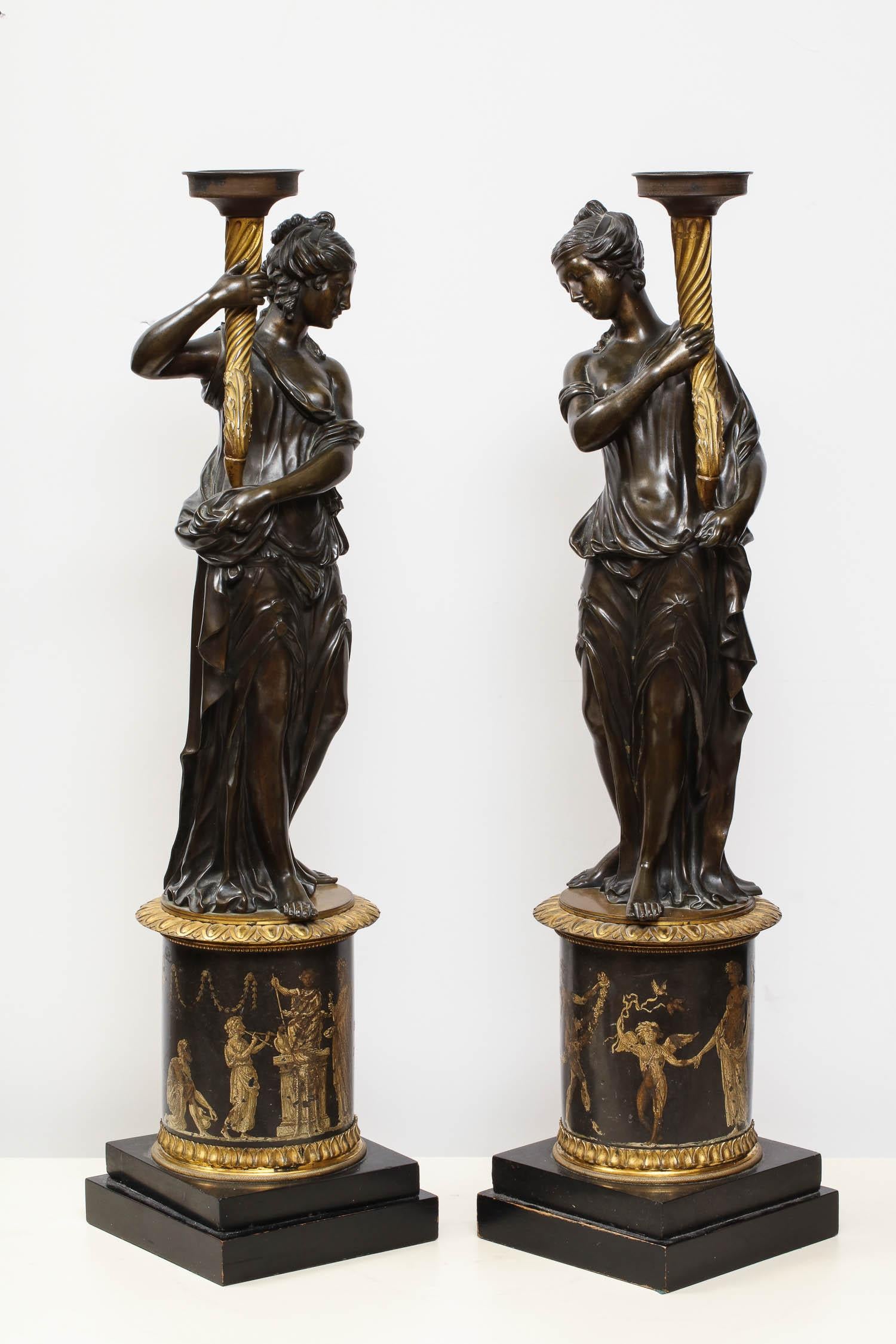 Large Pair of French Gilt and Patinated Bronze Figural Candleholders In Excellent Condition In New York, NY