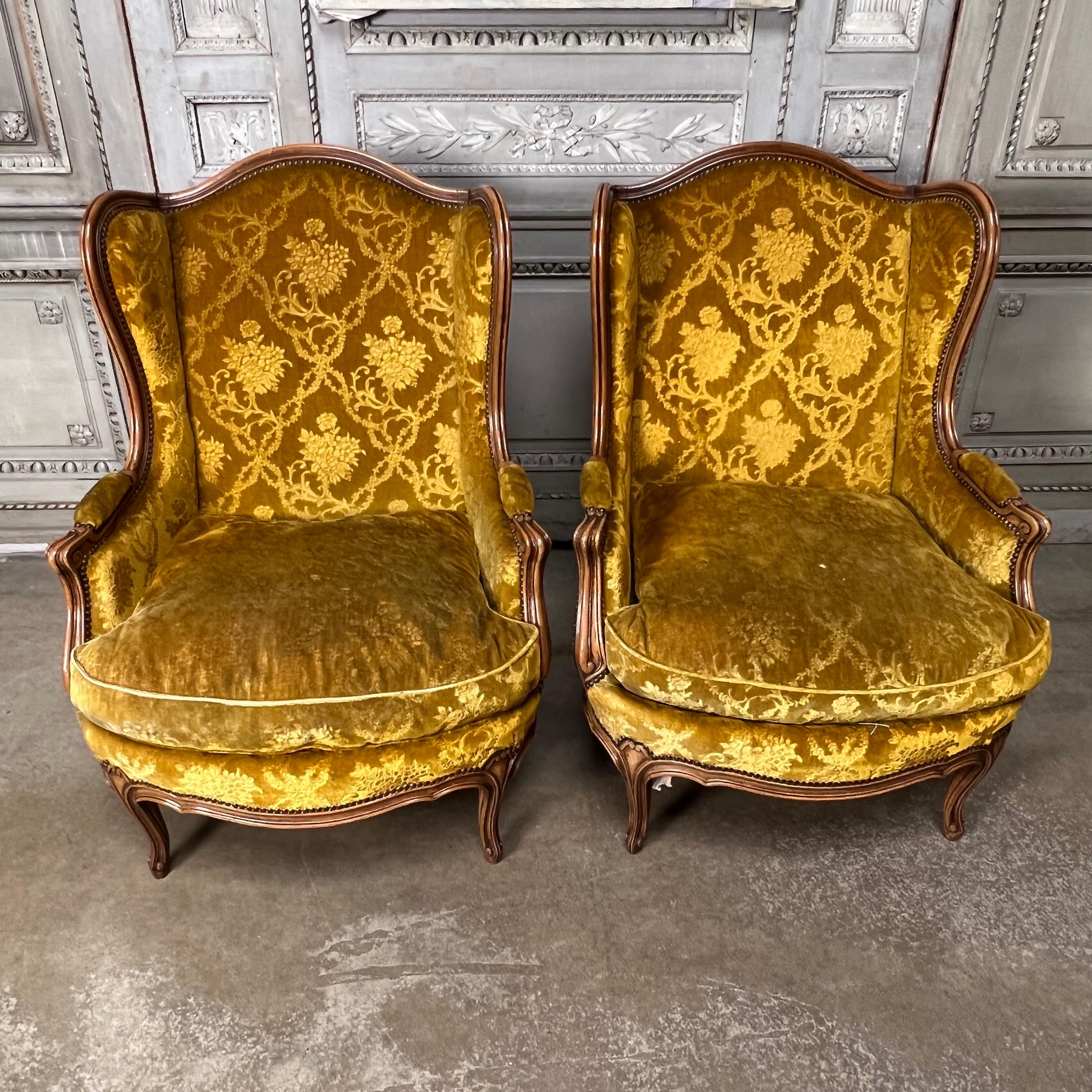 Hand-Carved Large Pair of French Louis XV Style Walnut Wingback Chairs For Sale