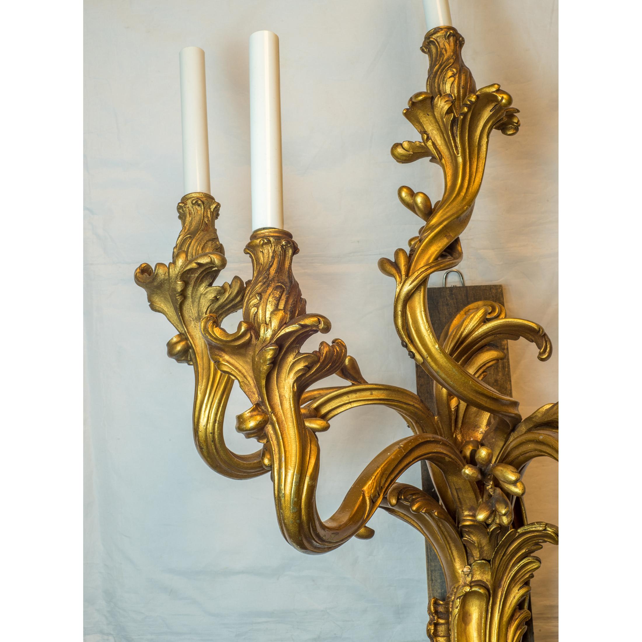 American Large Pair of French Rococo Style Five-Light Ormolu Sconces For Sale