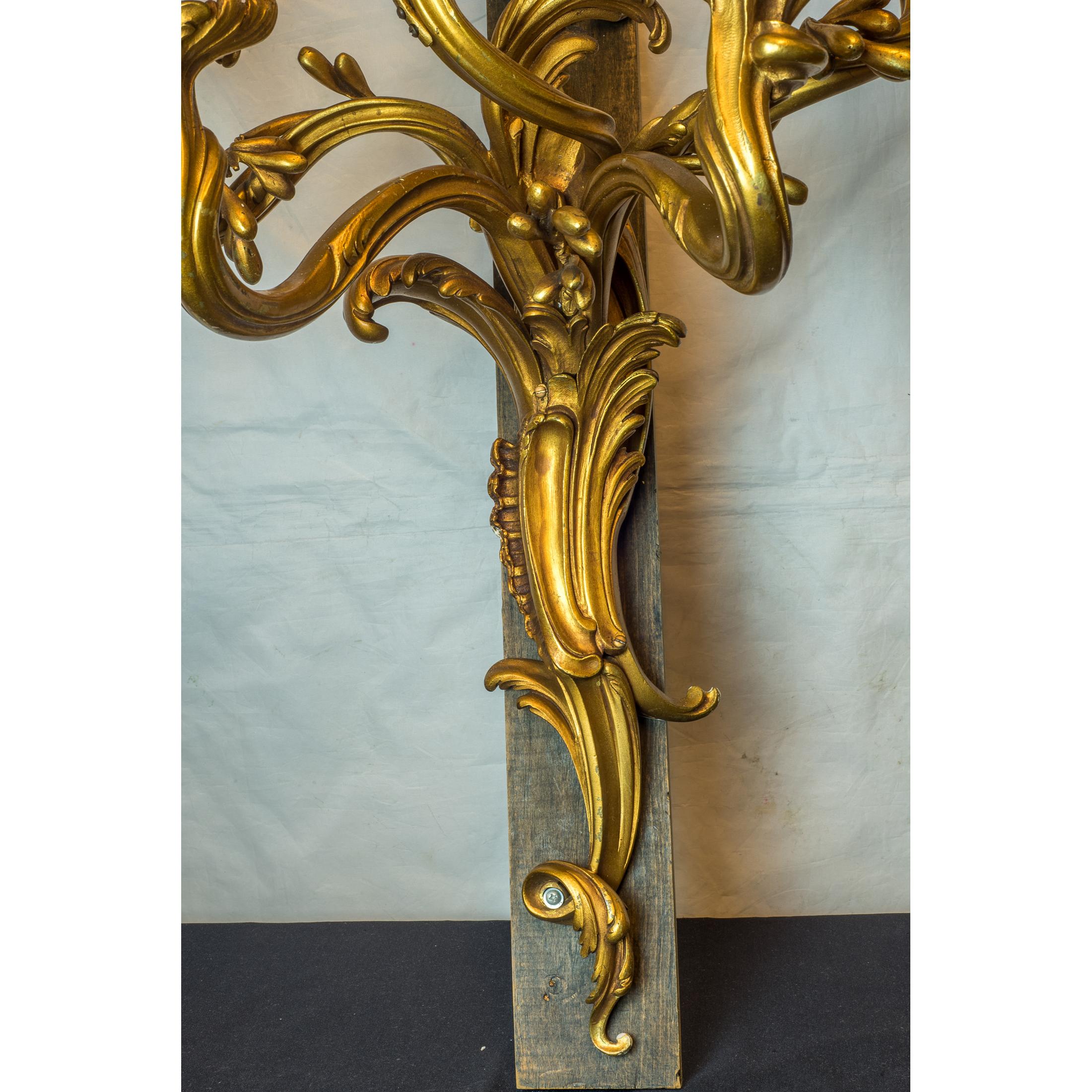 Gilt Large Pair of French Rococo Style Five-Light Ormolu Sconces For Sale