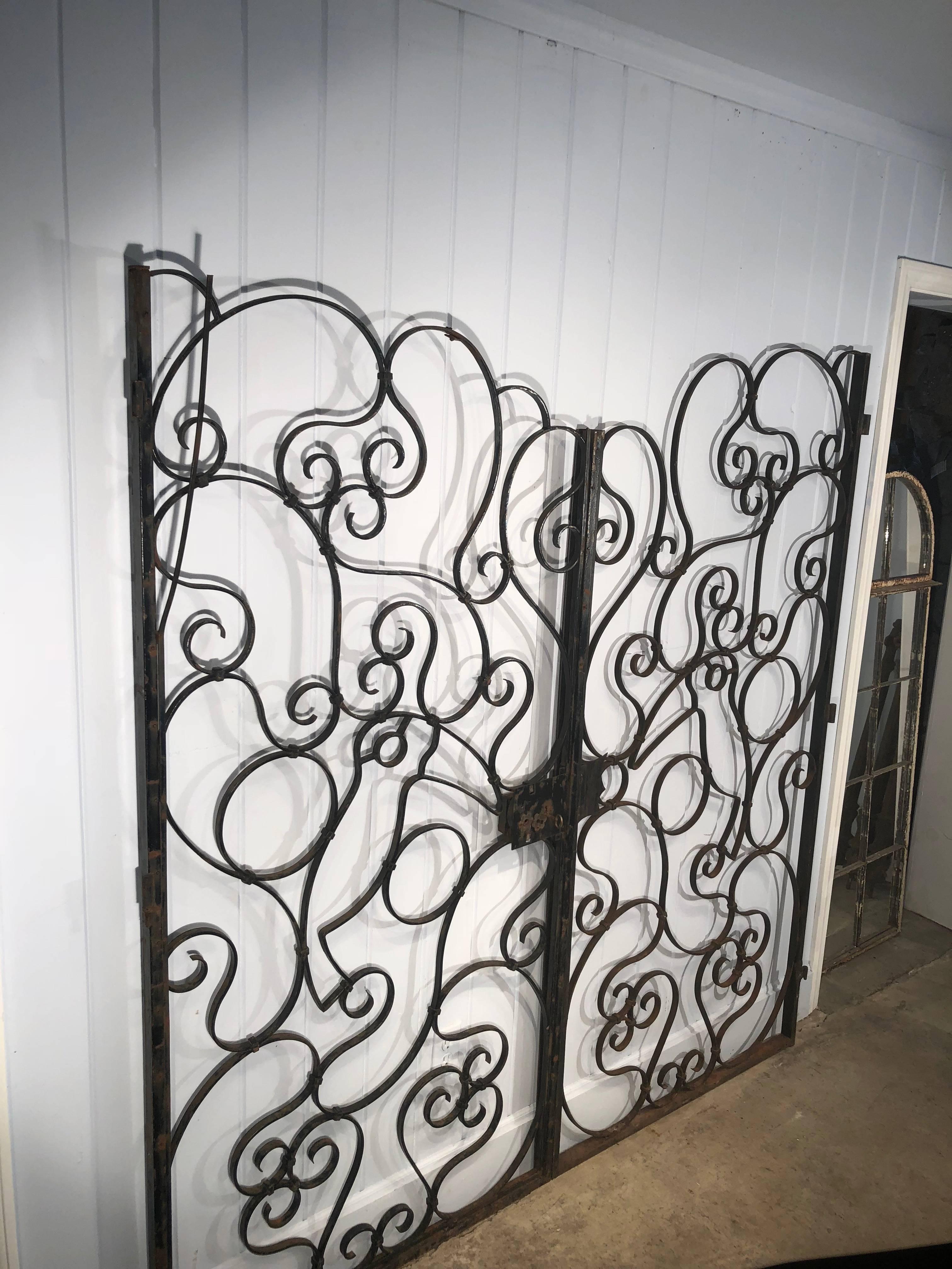 Now these gates are real show-stoppers! French-crafted of wrought iron with welded joints, they feature a pair of toucans, one on each side. They also have an 19th century lock with its original key that actually works! We will reattach the