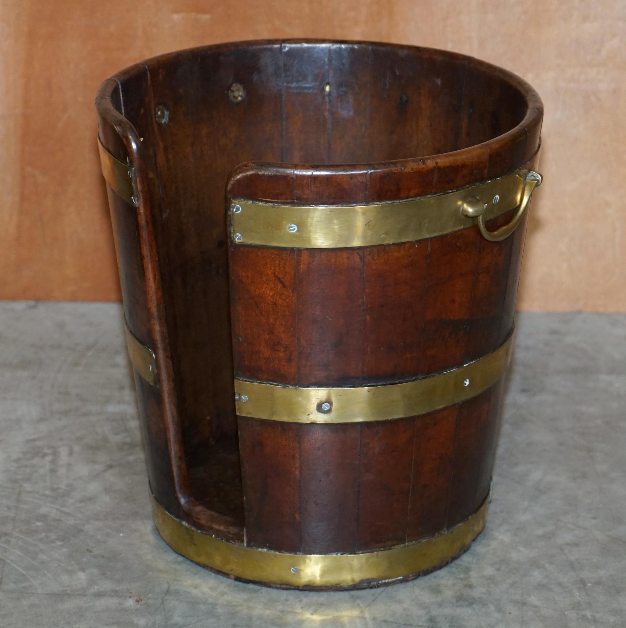 We are delighted to offer for sale this exquisite pair of large original George III plate buckets circa 1760 in the Military Campaign style, hand carved in mahogany with brass stap work

Highly collectable, handmade, these are just about as fine