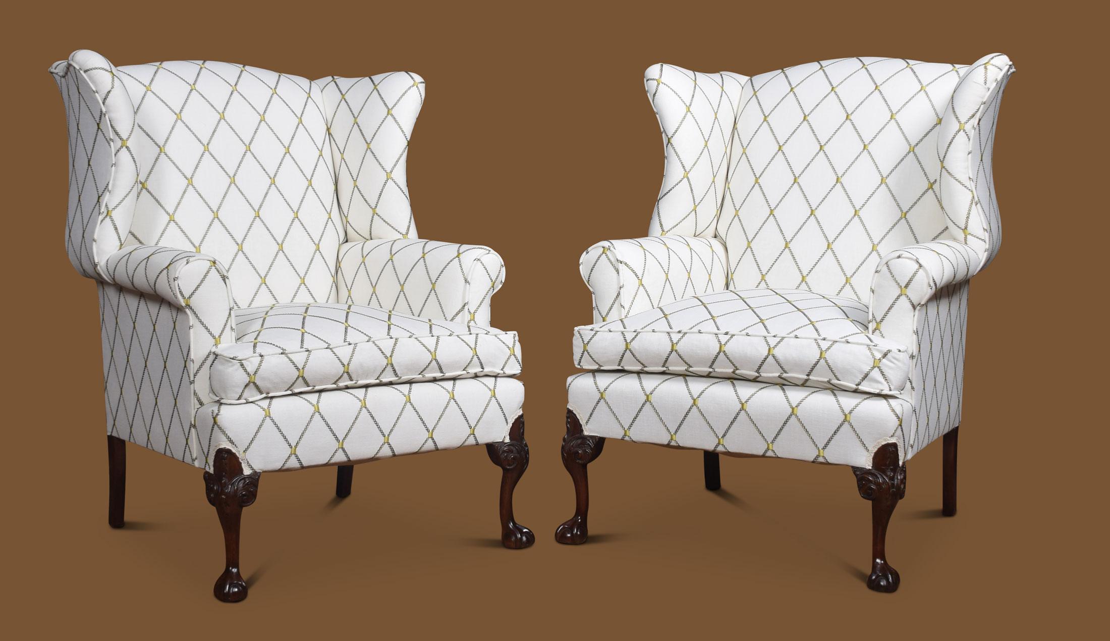 Very large pair of large Georgian style armchairs, the winged backs and out swept arms and removable cushion. Raised up on slender cabriole legs terminating in claw and ball feet.
Dimensions:
Height 43.5 inches height to seat 21 inches
Width 36