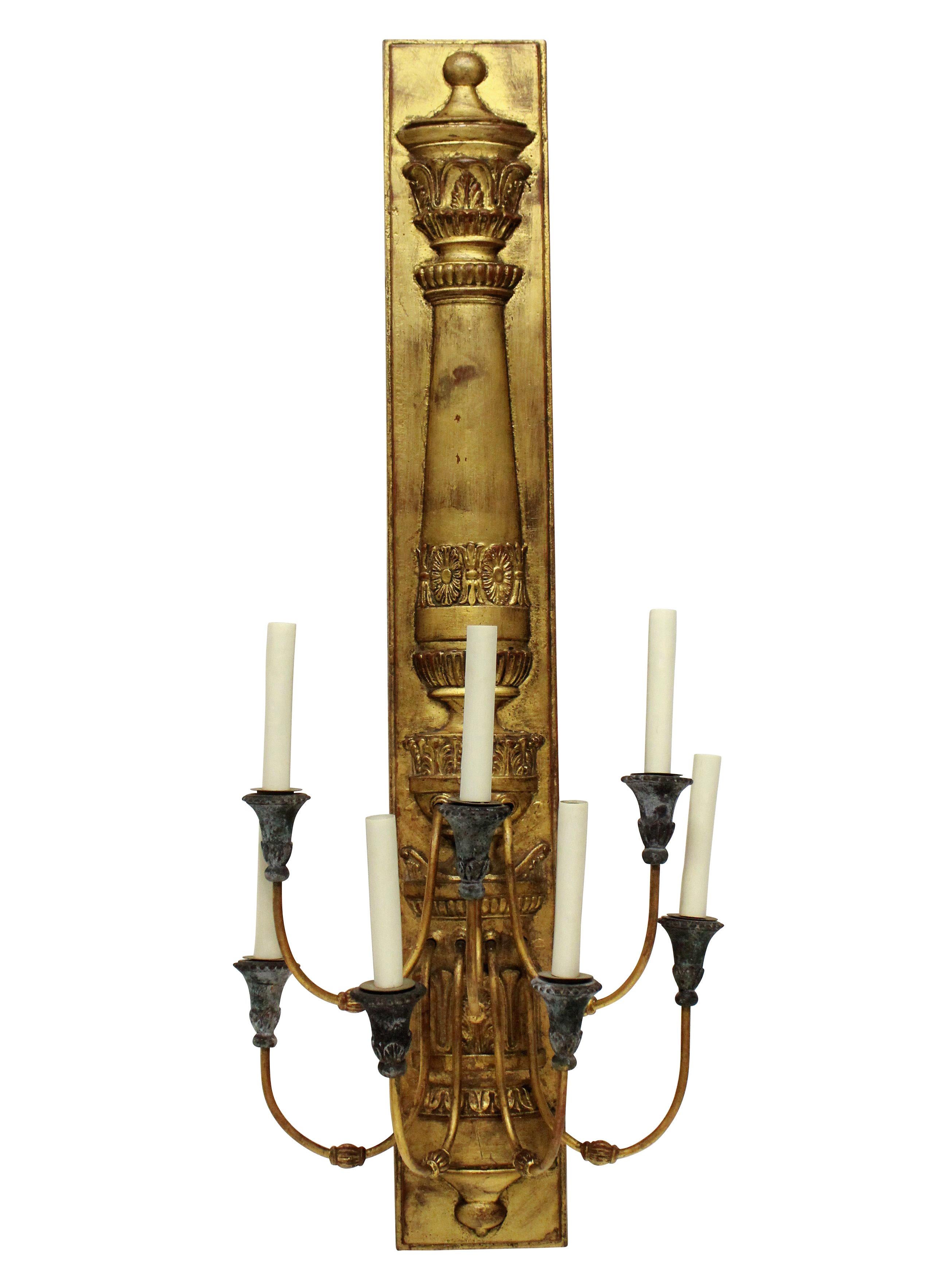 A pair of large French Empire style gilt metal wall sconces, each with five lights.

