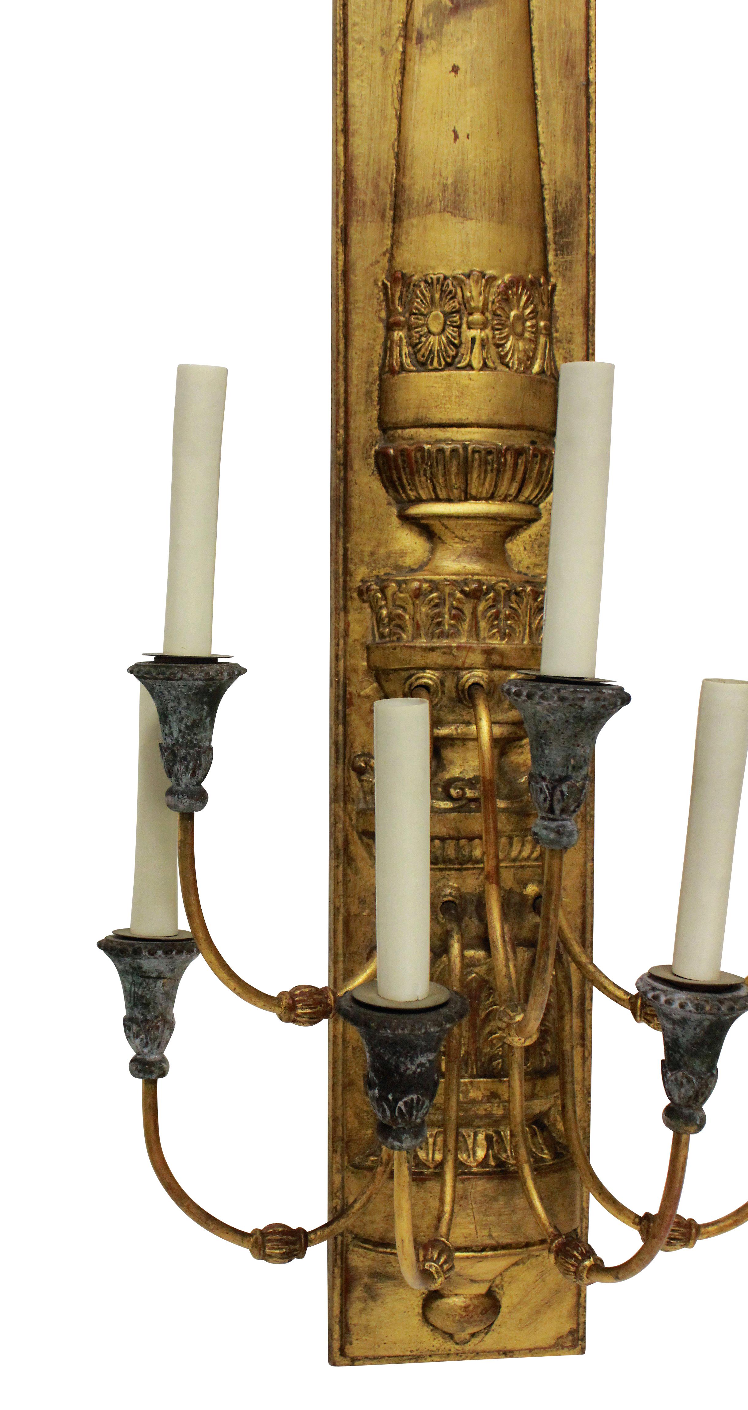A pair of large French Empire style gilt metal wall sconces, each with five-light.

  