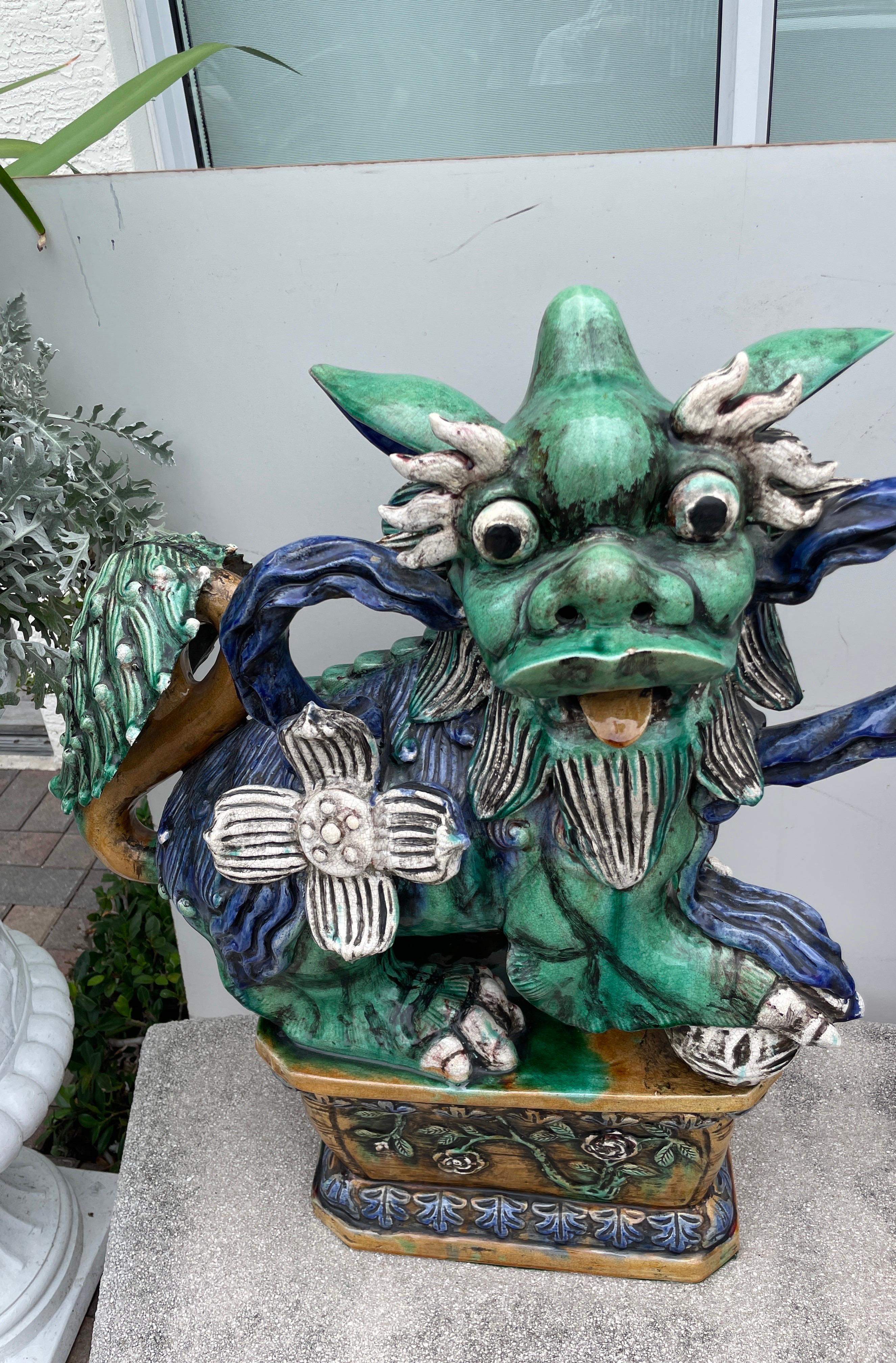 Chinese Large Pair of Glazed Terra Cotta Foo Dogs For Sale