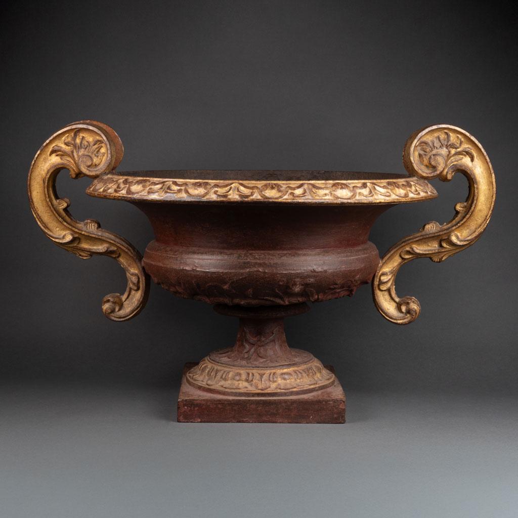 Large pair of gilded and painted iron cast urns

Red painted colour 