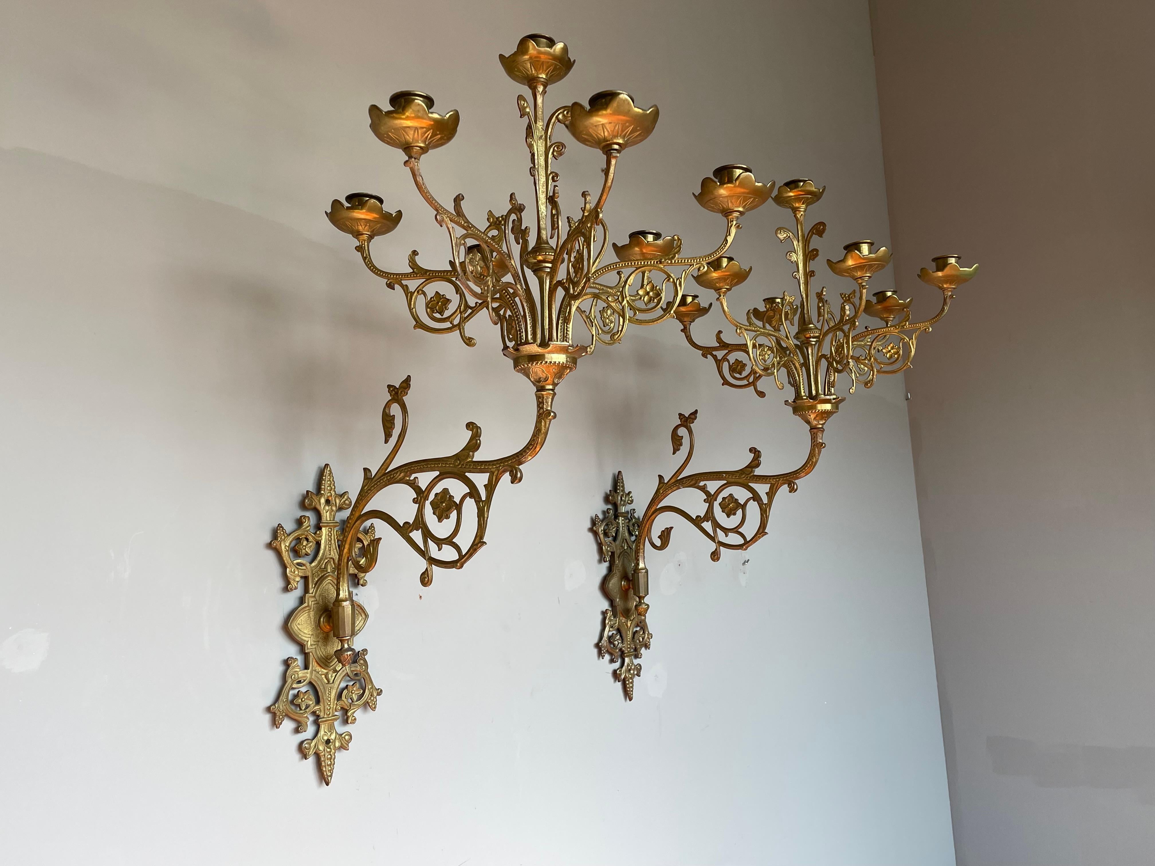 Beautiful and large size pair of Gothic Revival candle sconces for wall mounting.

This rare pair of antique Gothic wall sconces for seven candles each is another one of those antiques of which we immediately realize that they tick all the boxes.