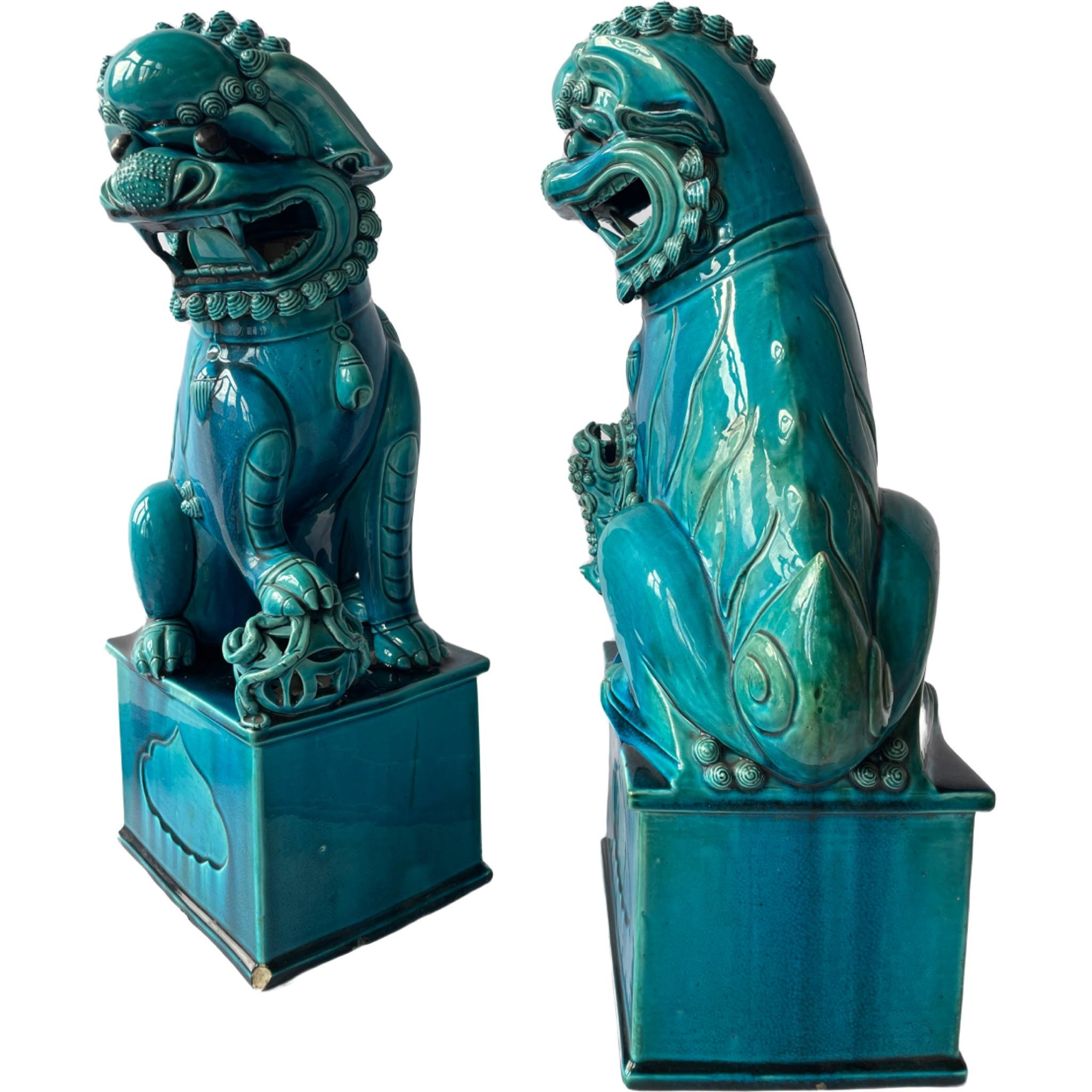 Chinese turquoise-colored porcelain foo dogs from circa 1880 are exquisite examples of traditional Chinese ceramic art. Foo dogs, also known as guardian lions or temple lions, are iconic mythical creatures in Chinese culture that symbolize