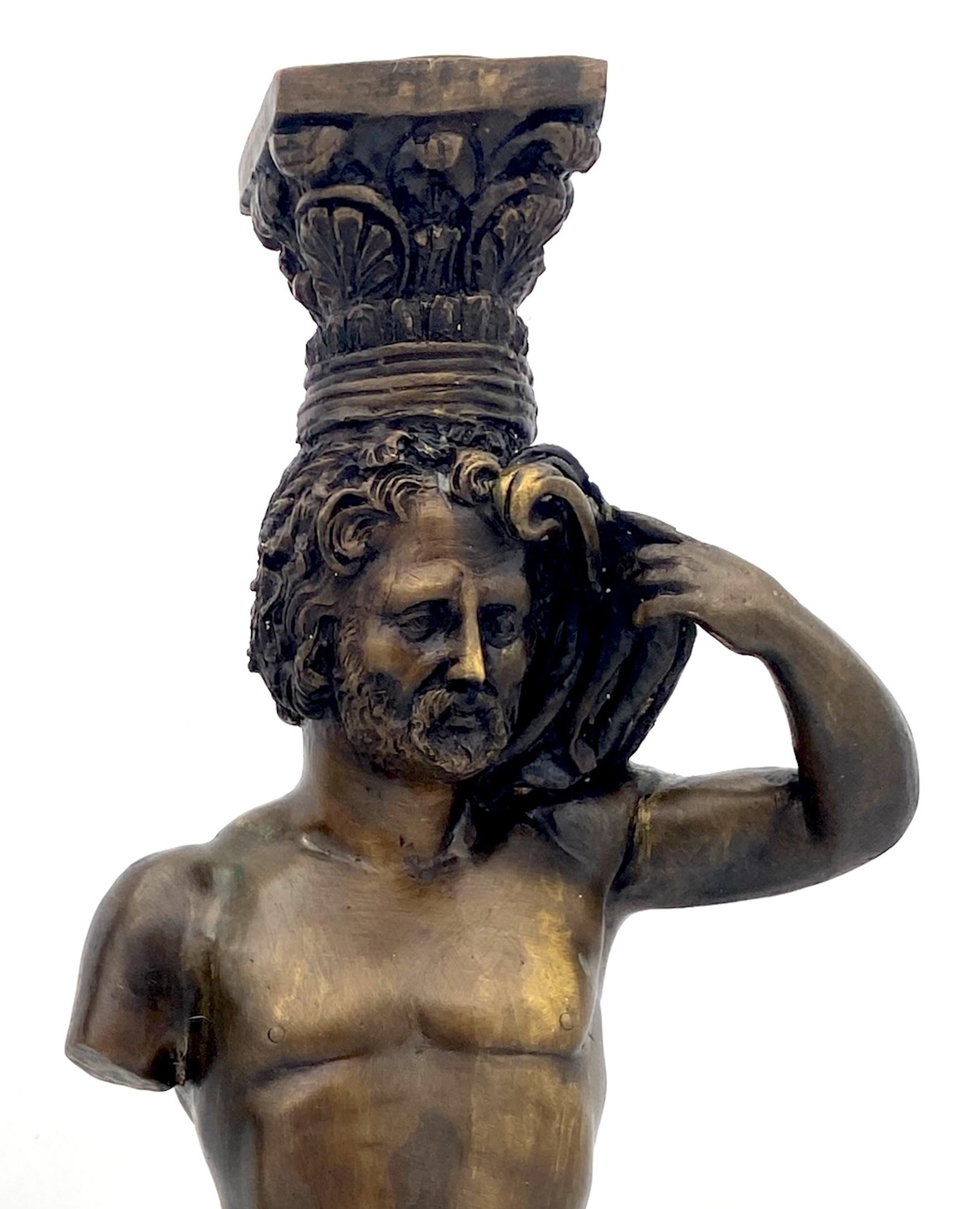 Cast Large Pair of Grand Tour Style  Bronze Male Caryatid Column Candlesticks For Sale