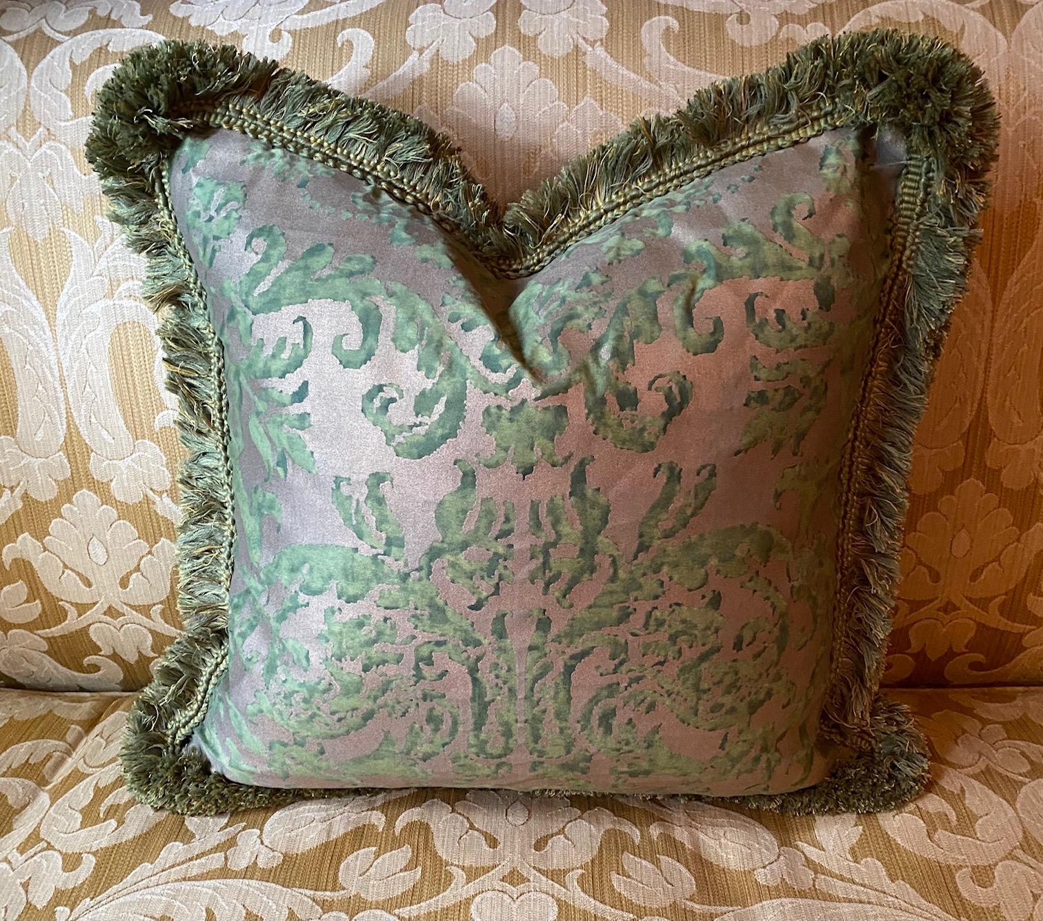 Large and decorative green-on-silver Fortuny down-filled cushions with brush fringe and green velvet backing

'Farnese' pattern

20
