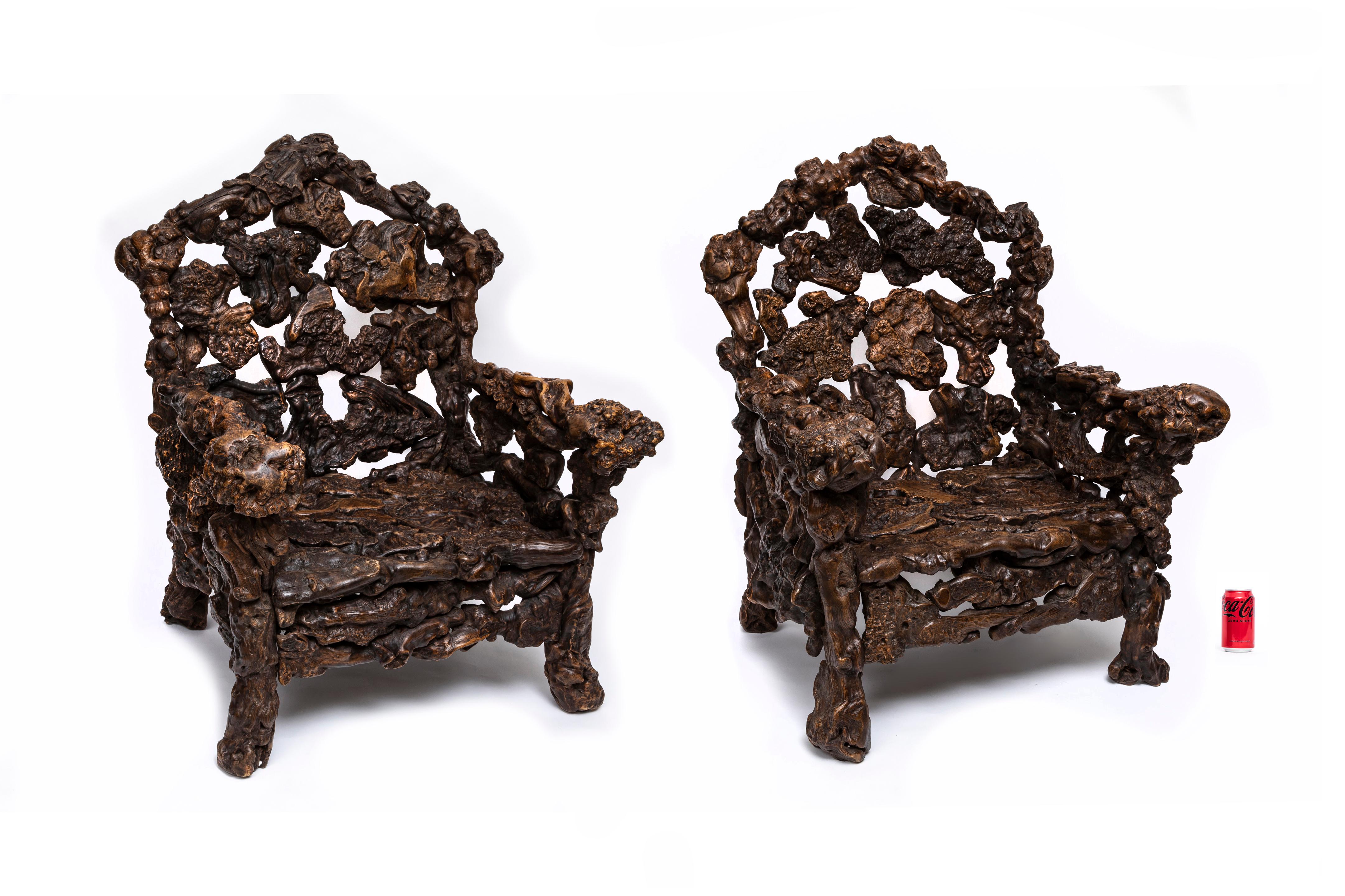 A Magnificent and Quite Large Pair of Hand-Carved 19th Century Chinese Rootwood Throne Chair/Arm Chairs. According to an article posted by the MET Museum, rustic rootwood chairs such as these were meant to suggest Buddhist and Daoist figure’s lack