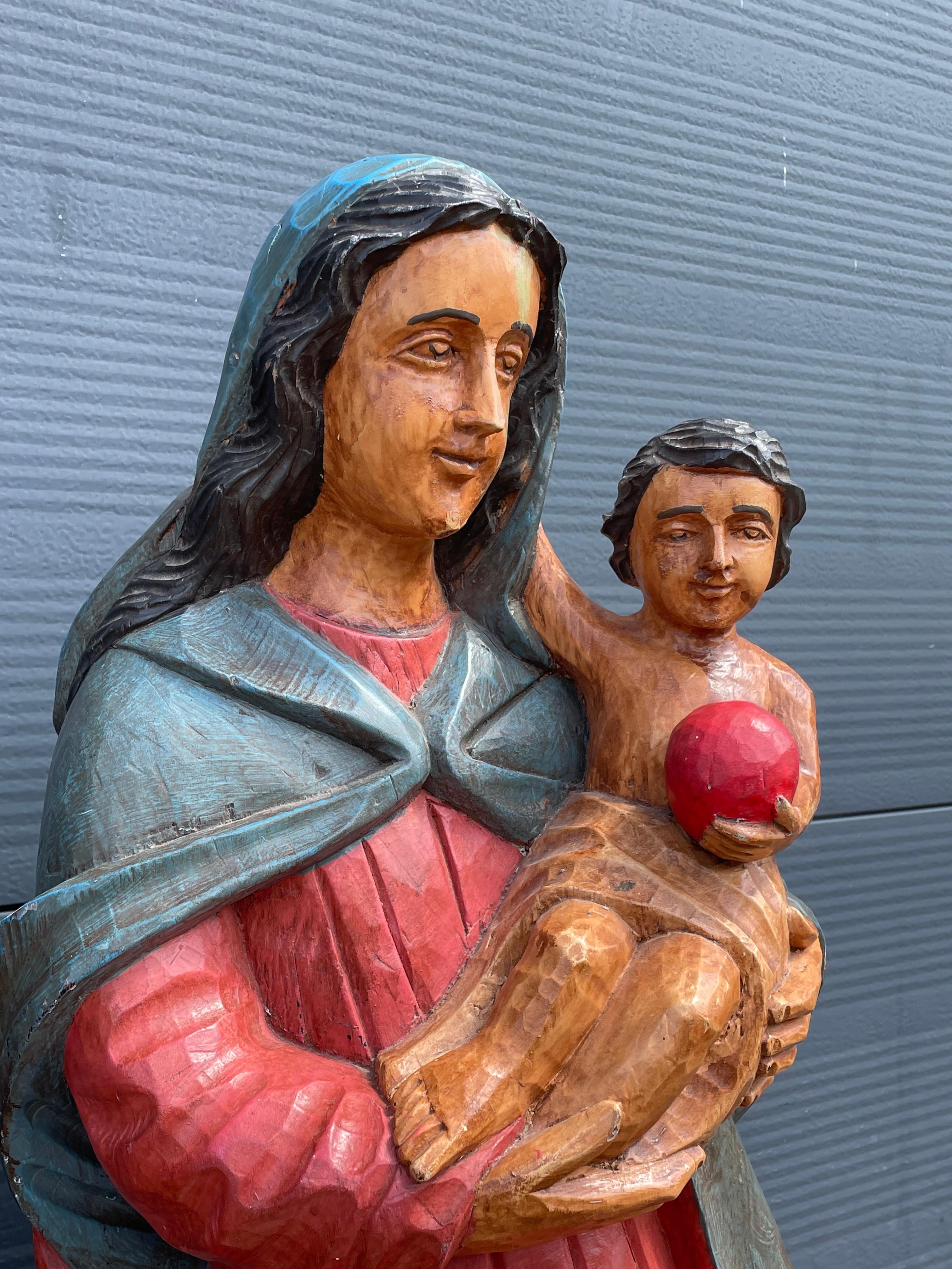 Hand-Crafted Large Pair of Hand Carved Wooden Mary & Joseph Sculptures, Both with Child Jesus For Sale