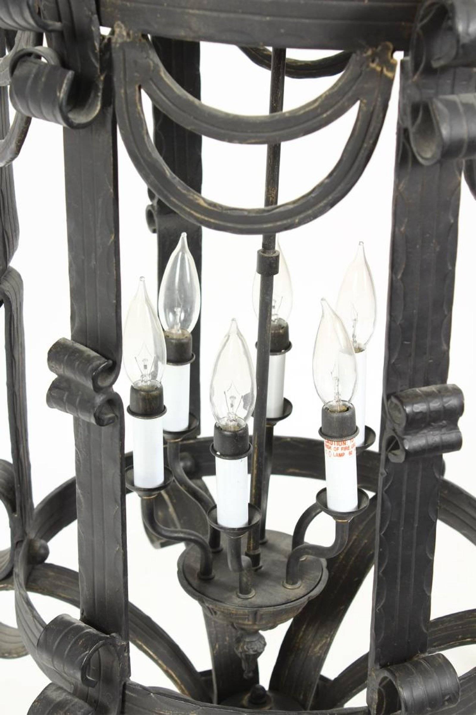 A nice large pair of hand-forged iron lanterns, having six lights.