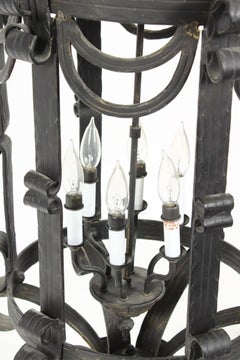 Large Pair of Hand Forged Six Light Scrolled Iron Lanterns
