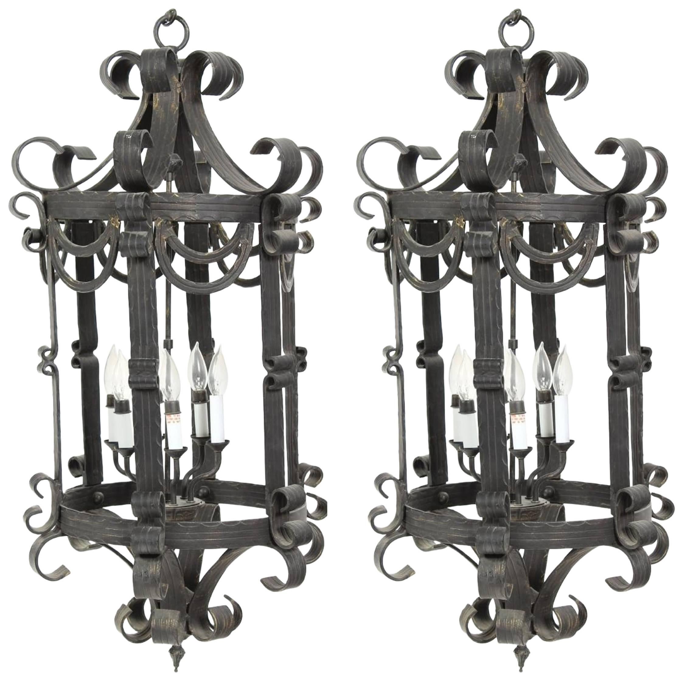  Large Pair of Hand Forged Six Light Scrolled Iron Lanterns For Sale