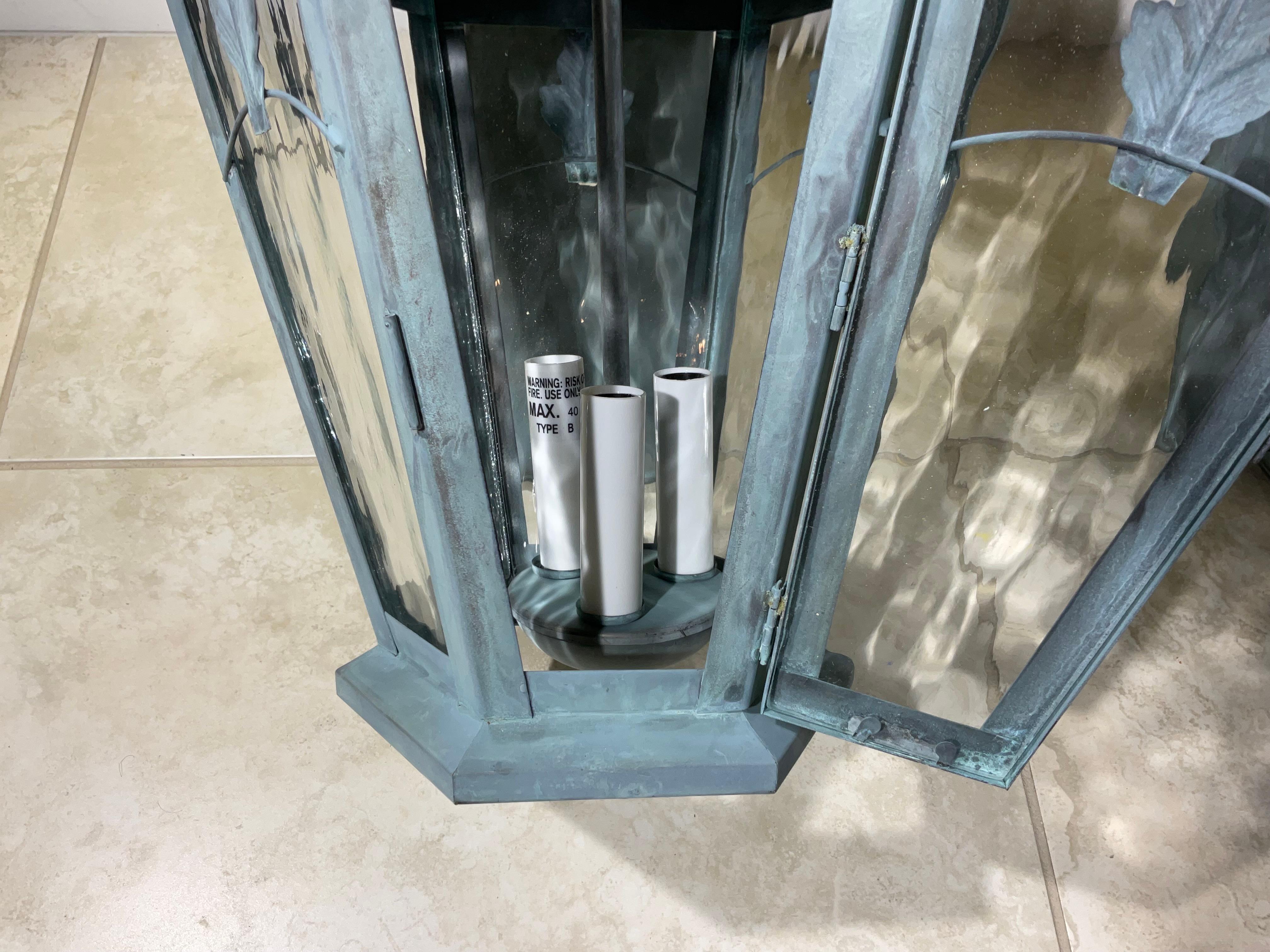 Quality pair of wall lantern handcrafted from solid brass with three 40/watt lights each lantern up US code suitable for wet location. 
