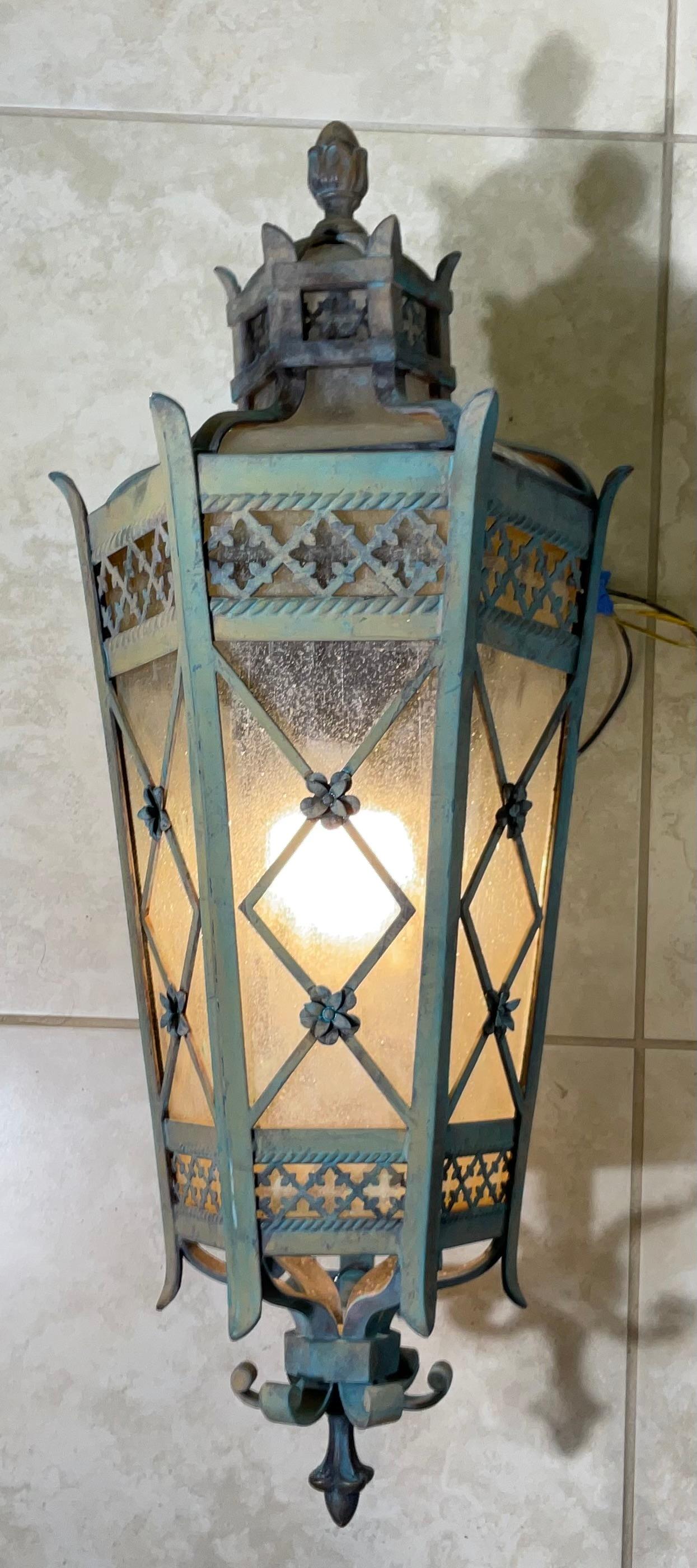 

These stunning vintage wall sconces are crafted from brass and feature a beautiful distressed finish that adds a touch of old-world charm. The intricate design of the sconces with top crown style is sure to make a statement in any front door or