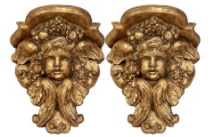 Grande paire de consoles ou supports muraux italiens en bois sculpté et doré