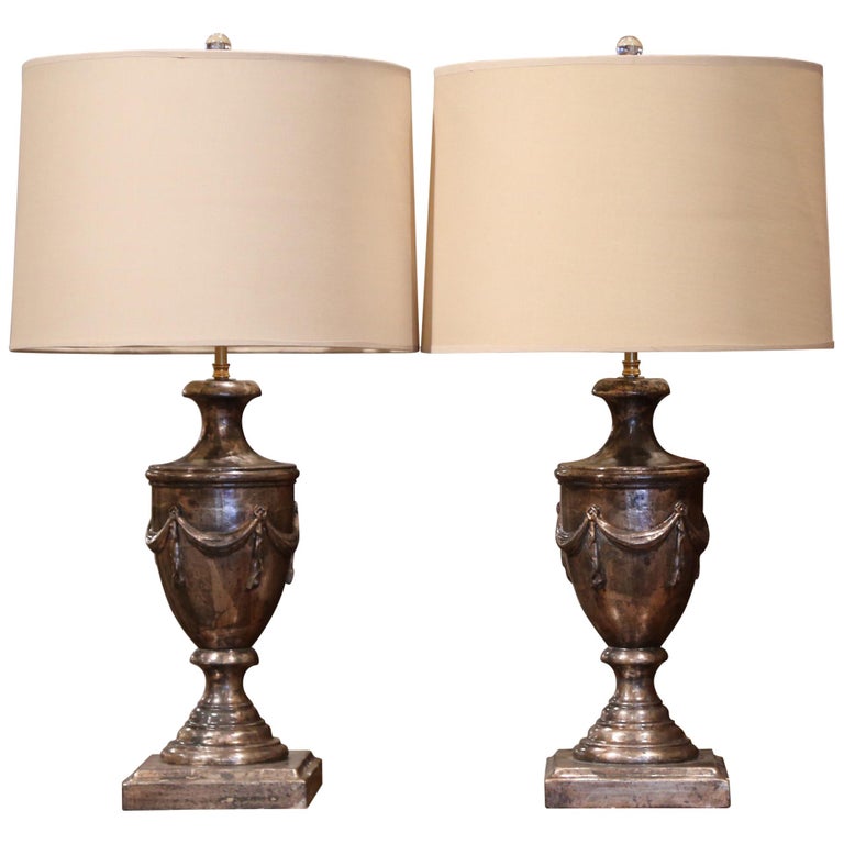 Large Pair of Italian Carved and Silver Leaf Urn Shape TwoLight Table