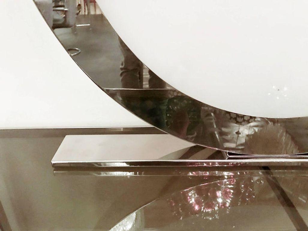 Each lamp has two frosted glass panels, glossy finish on the outside, matte finish on the inside, mounted on polished chrome frame / made in Italy, circa 1990s.