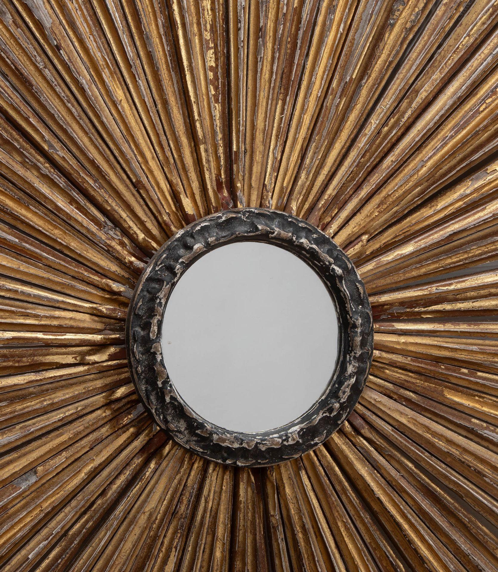 A fabulous pair of 19th Century Italian distressed gilt wood sunburst mirrors.
Circa 1850.