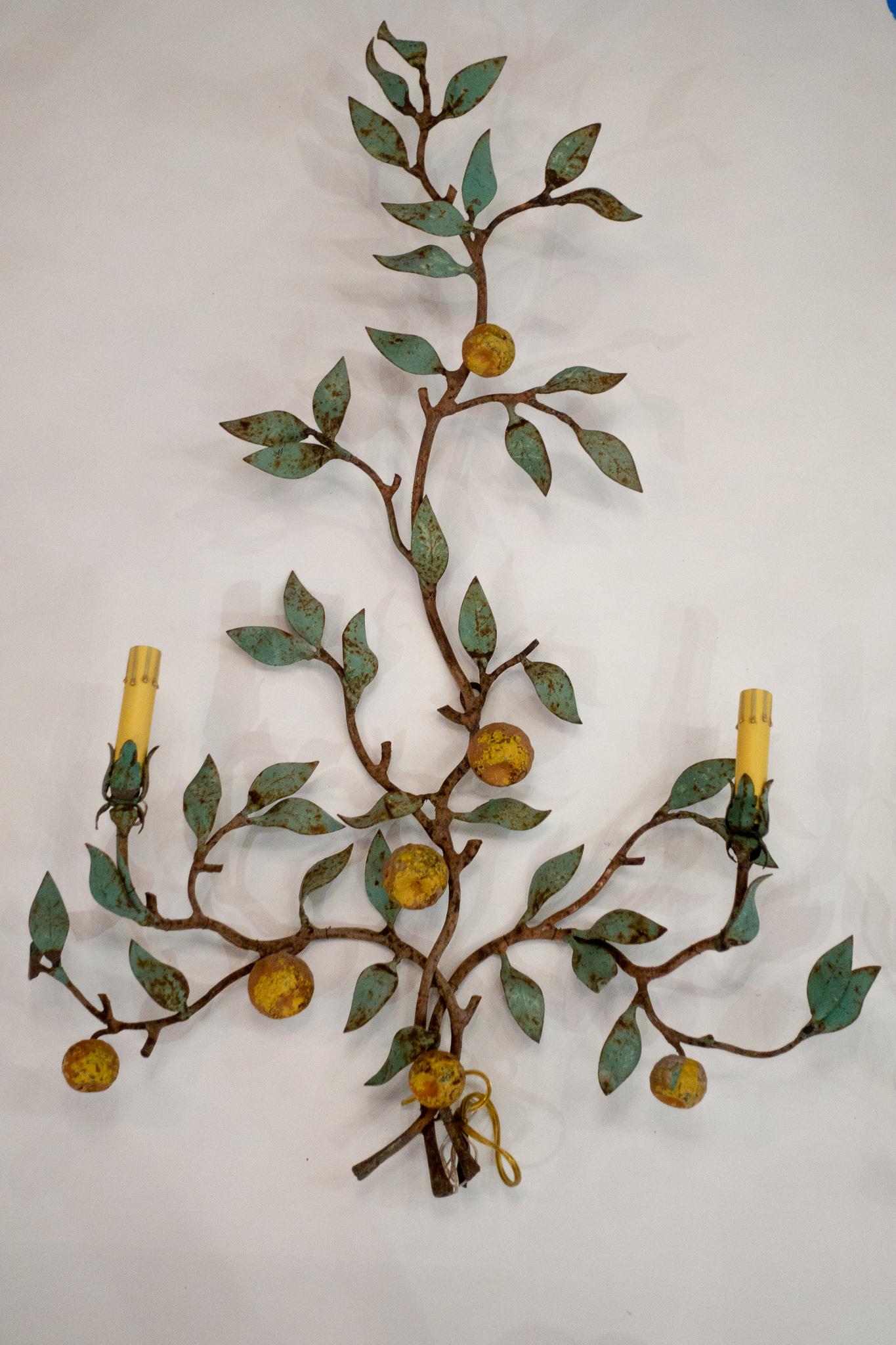 Beautiful pair of large Italian painted metal sconces bearing lemons from the 1940s.