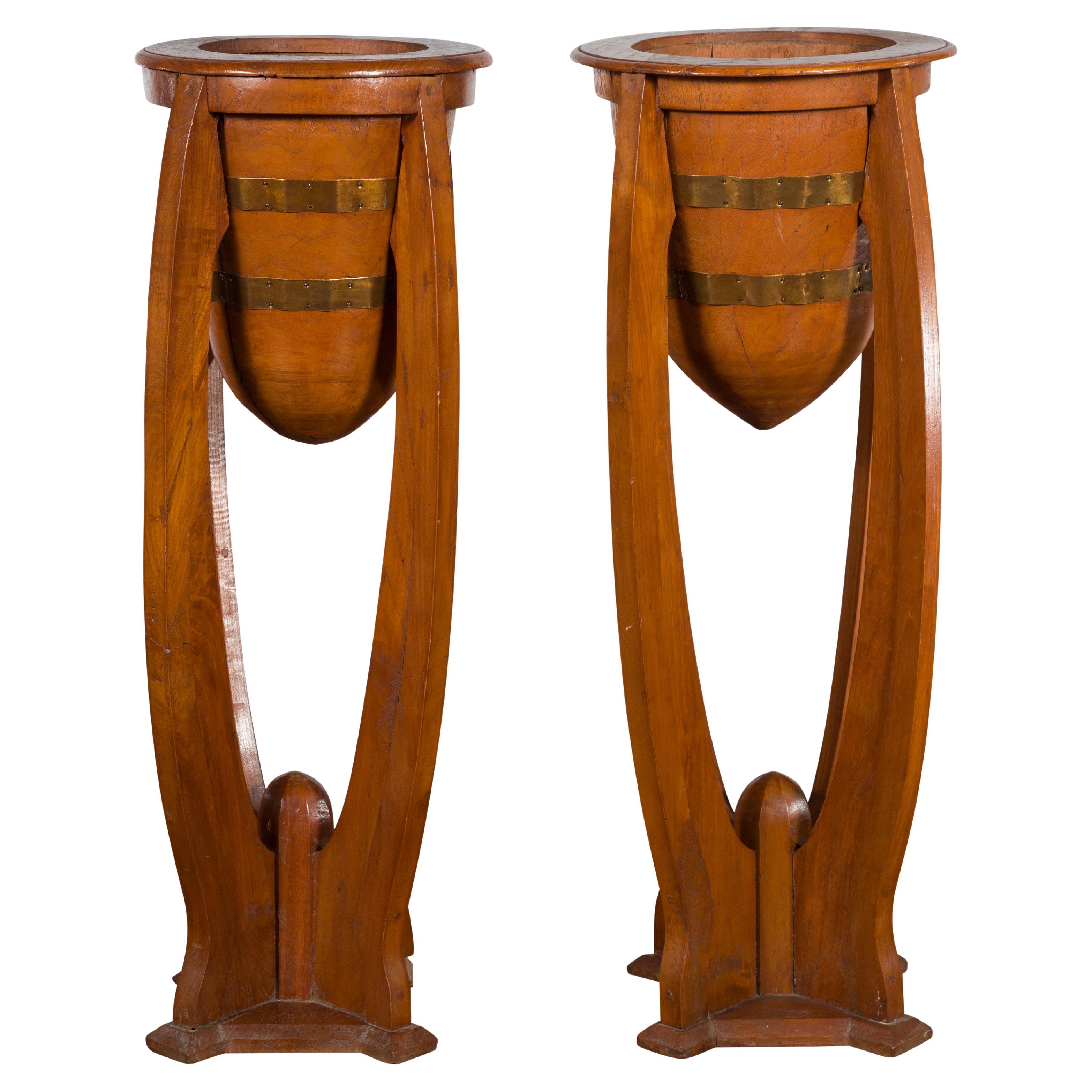 Large Pair of Javanese Art Deco Style Teak Wood Plant Stands with Brass Braces For Sale