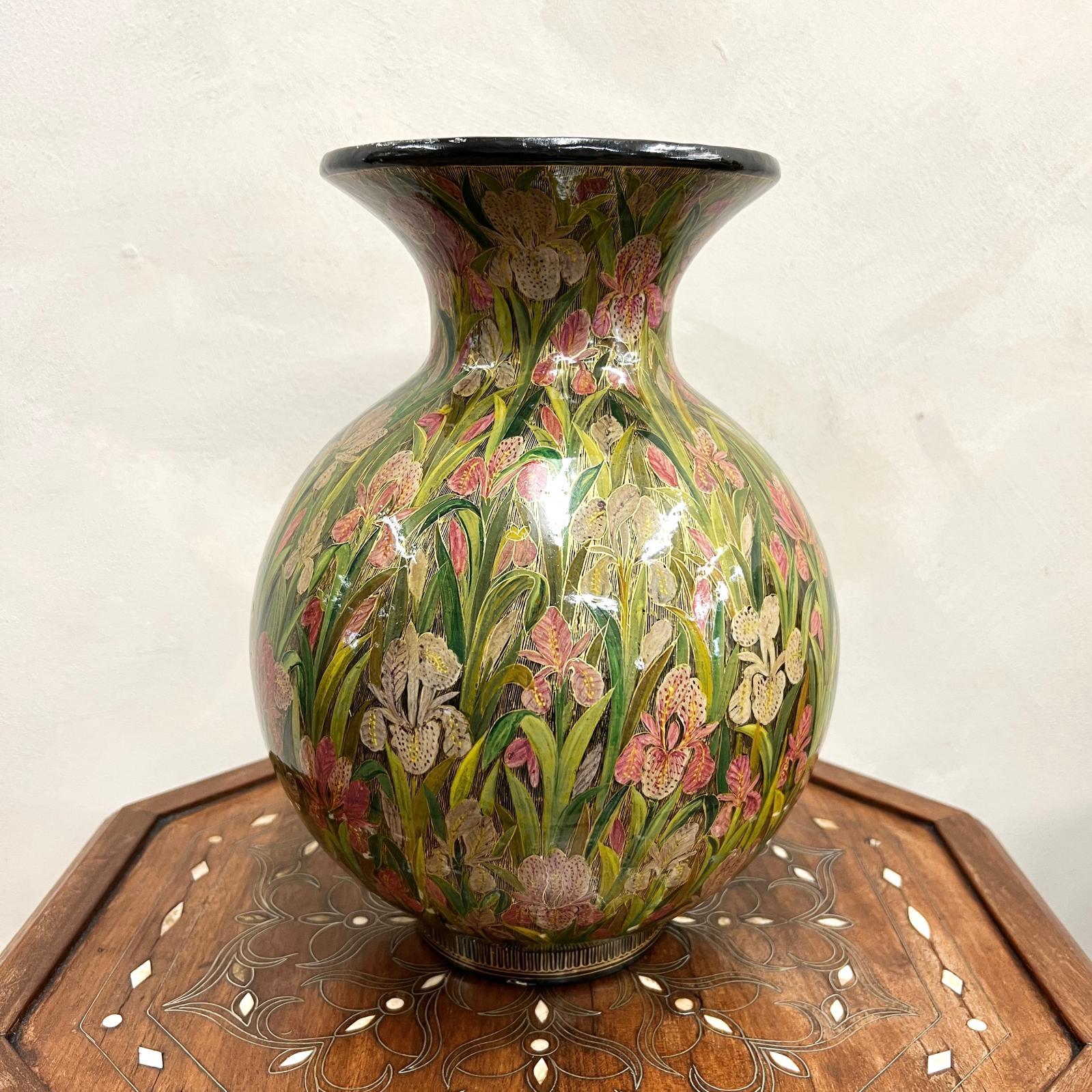 Pair of large, hand painted, papier-mâché Vases.
Beautifully decorated with irises.
You can see inside what they have been intricately made from with old text on the paper 
We can arrange for lamp conversion if required.

Kashmir, circa