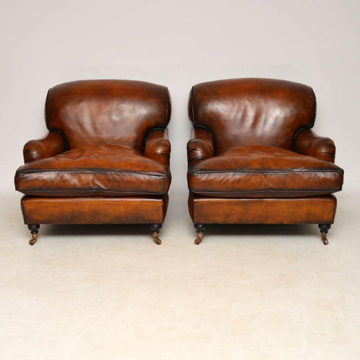 Large pair of leather antique ‘Howard’ style armchairs in wonderful condition and extremely comfortable. The leather is a wonderful colour with loads of character and a great antique look. These armchairs are in excellent condition and I would say