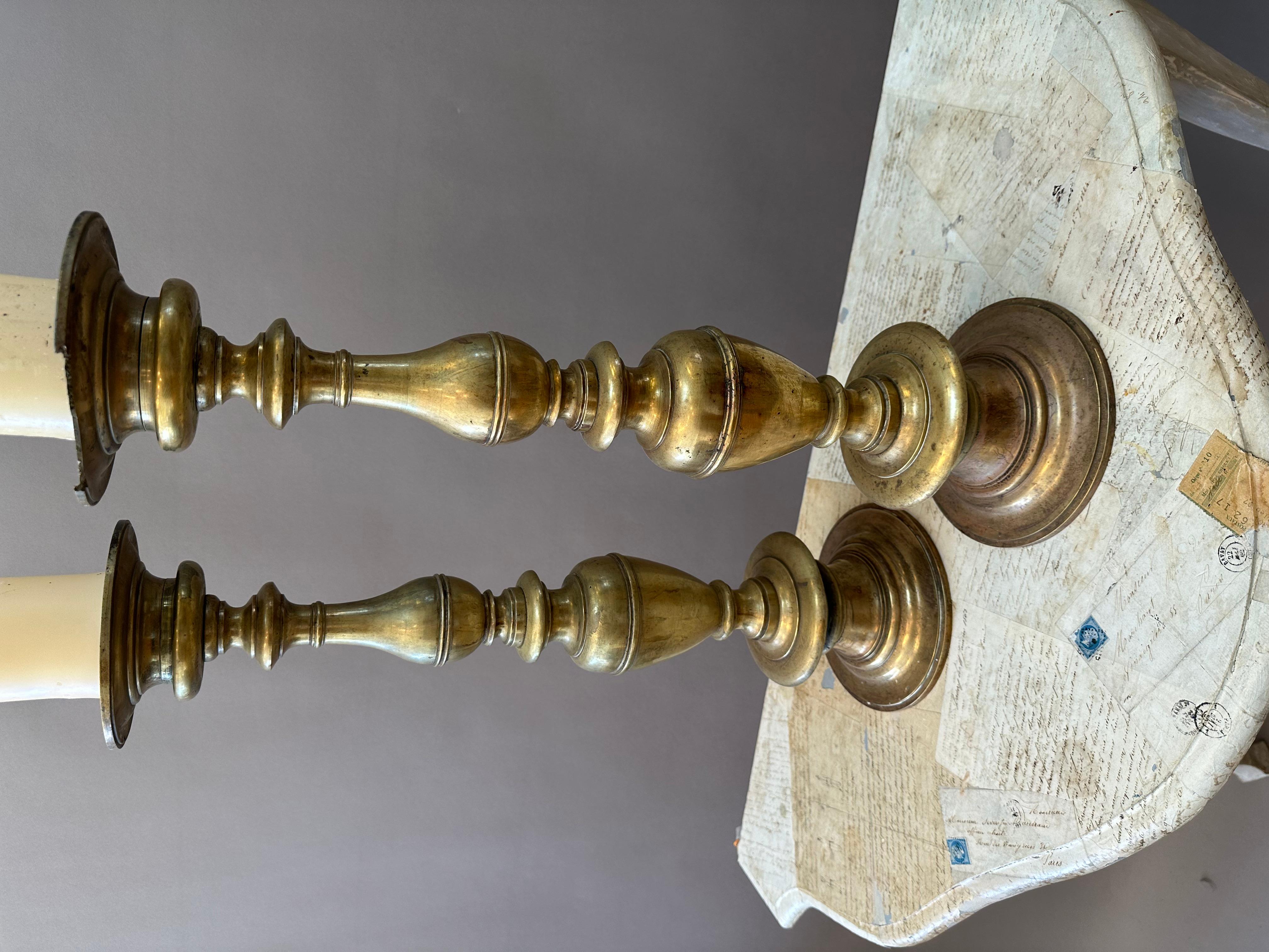 Large Pair of Louis XIV Bronze Candlesticks. Grand proportions with typical Baroque turned structure. Made in Burgundy. Circa 1680.