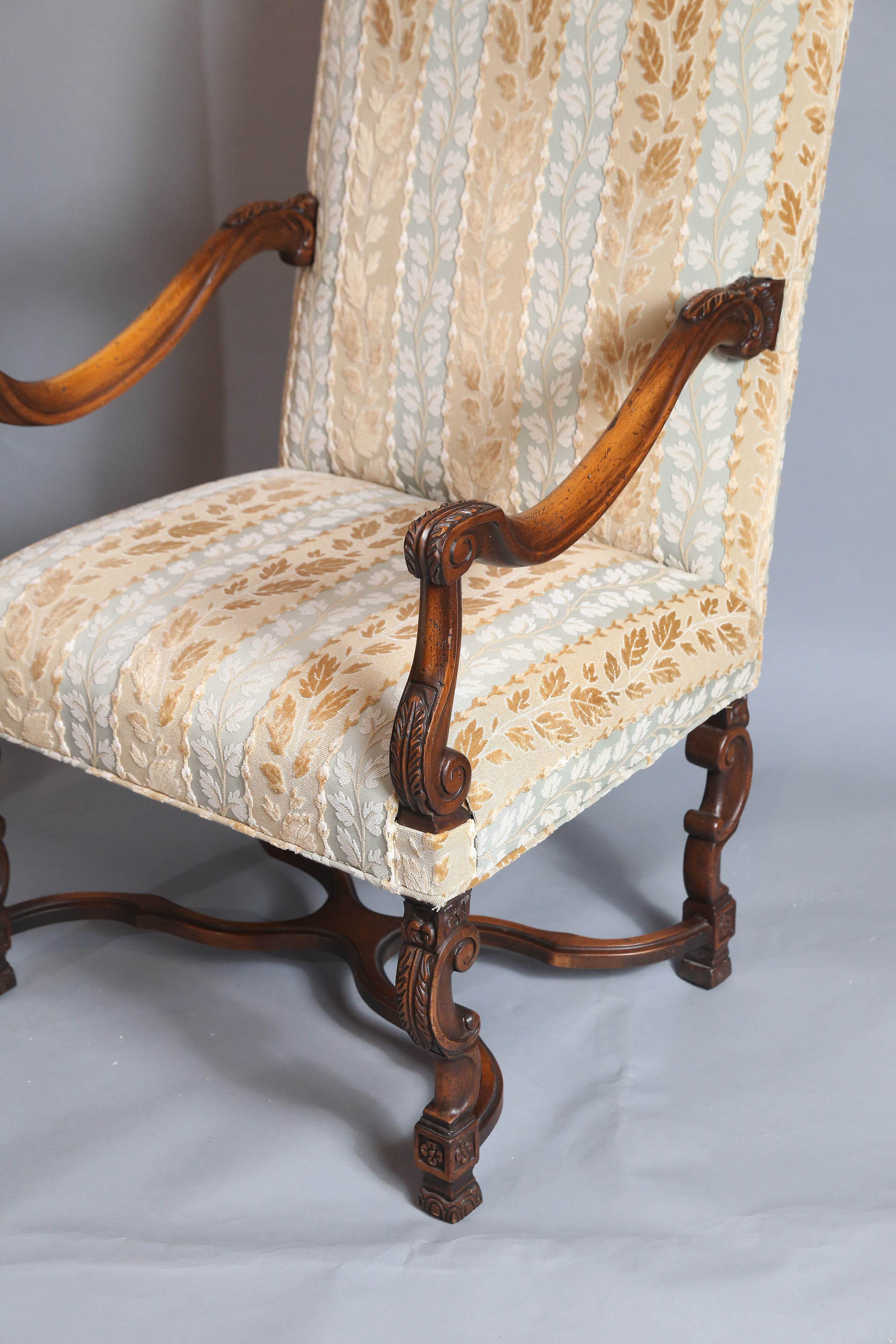 Pair of large Fruitwood Louis XIV-style high-back Occasional chairs with beautiful patina.

Arms, legs and stretchers all shaped, almost sculptural, and feature acanthus carvings.



Similar pair available in different fabric.

