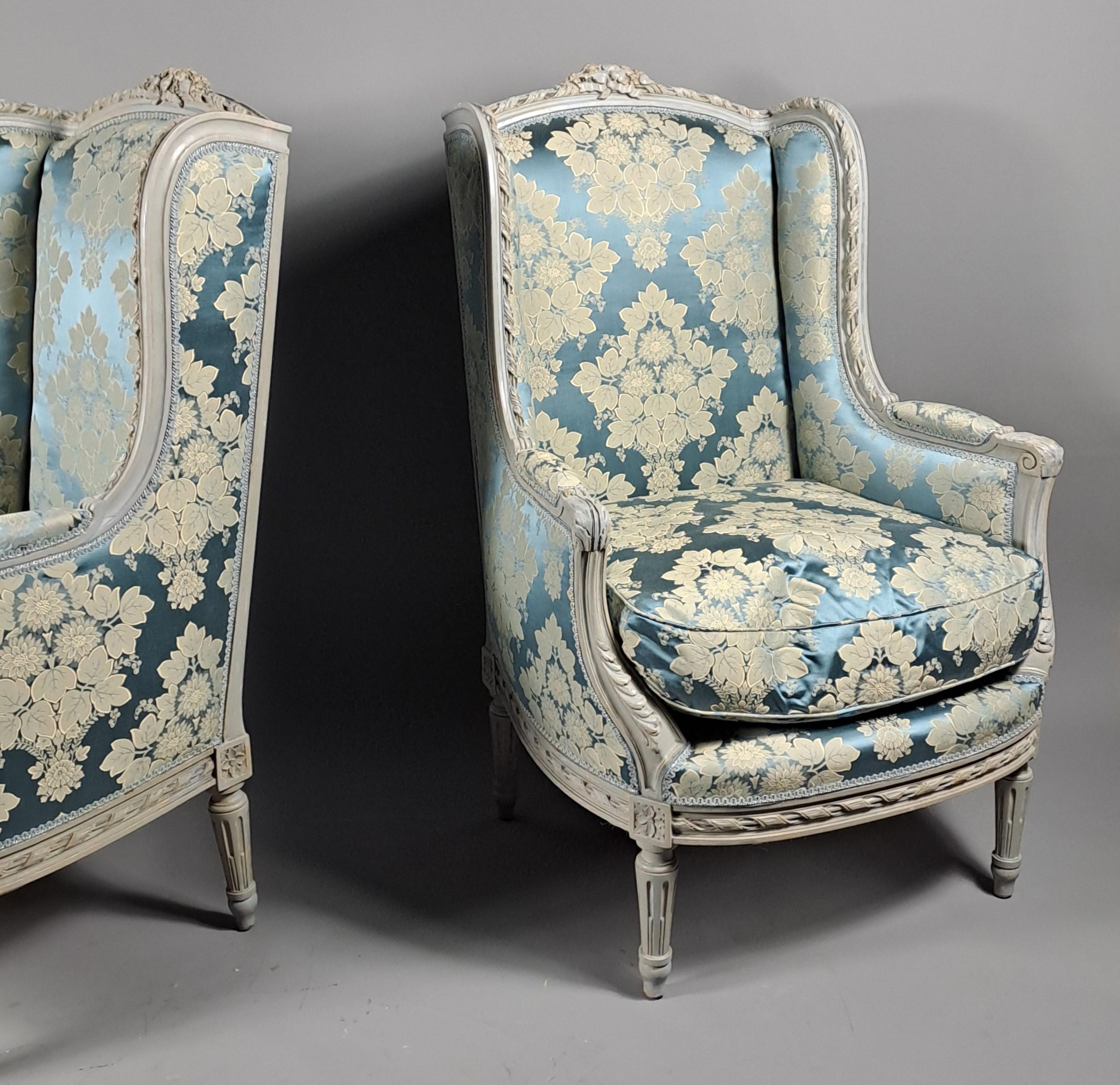 XIX secolo Large Pair Of Louis XVI Style Lacquered Wood Wing Chairs in vendita