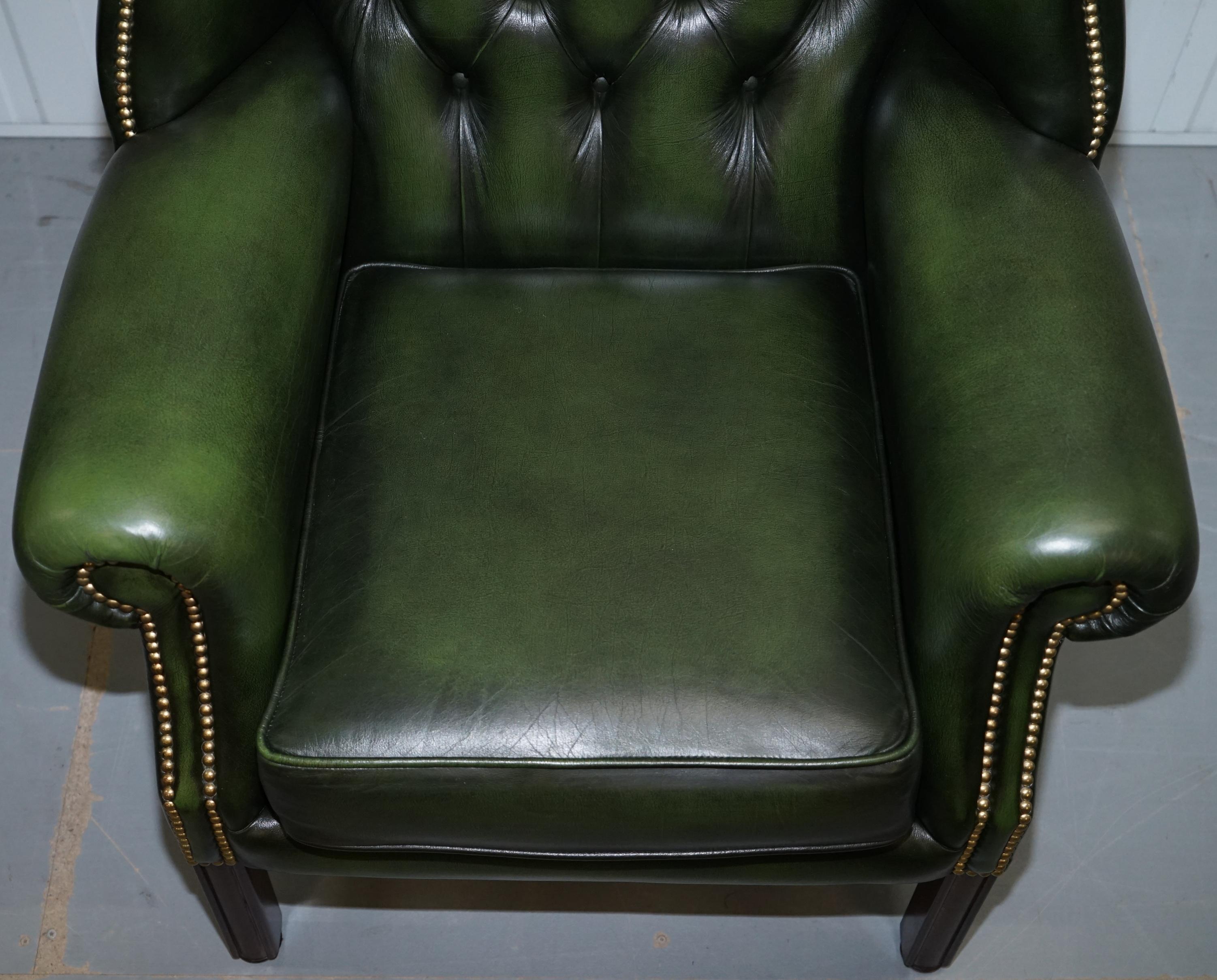 green leather wingback armchair