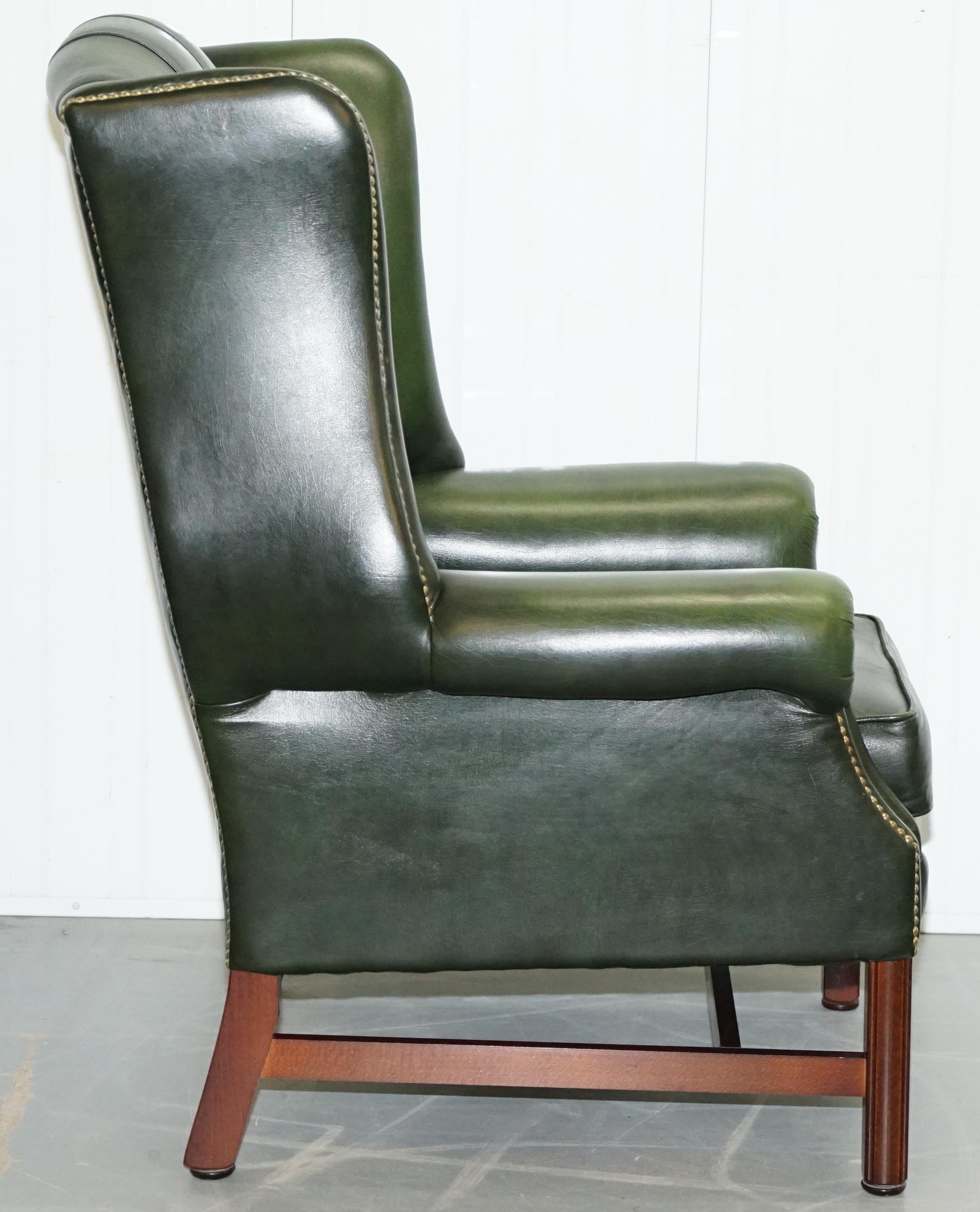 English Large Pair of Luxury Green Leather Chesterfield Wingback Armchairs & Footstool