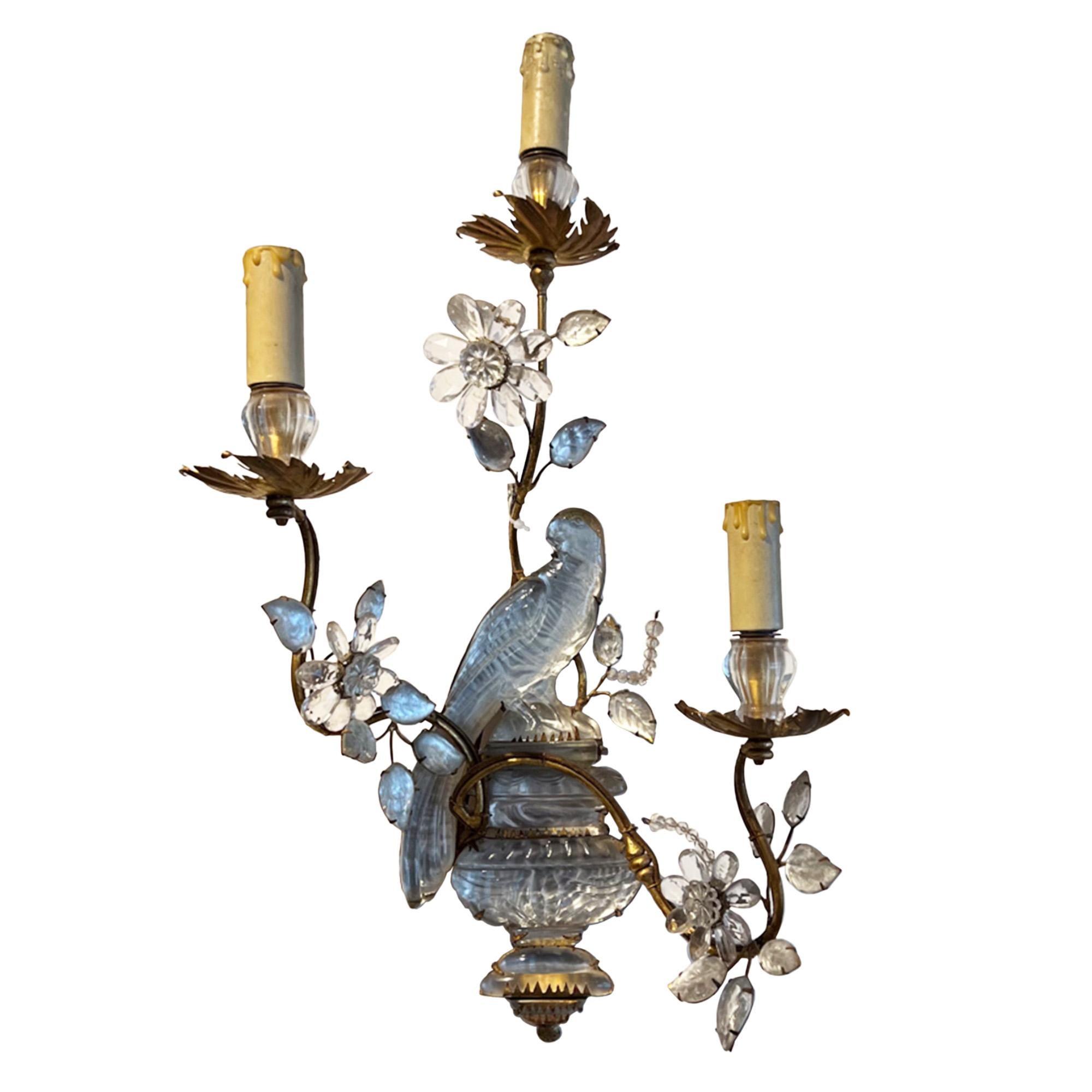 This is a stunning pair of large Maison Baguès wall sconces with their iconic parrot and urn design. This set have 3 torches per light, we also have pairs with 2 bulb holders. Please get in touch if you'd like more information.

Take a look at all