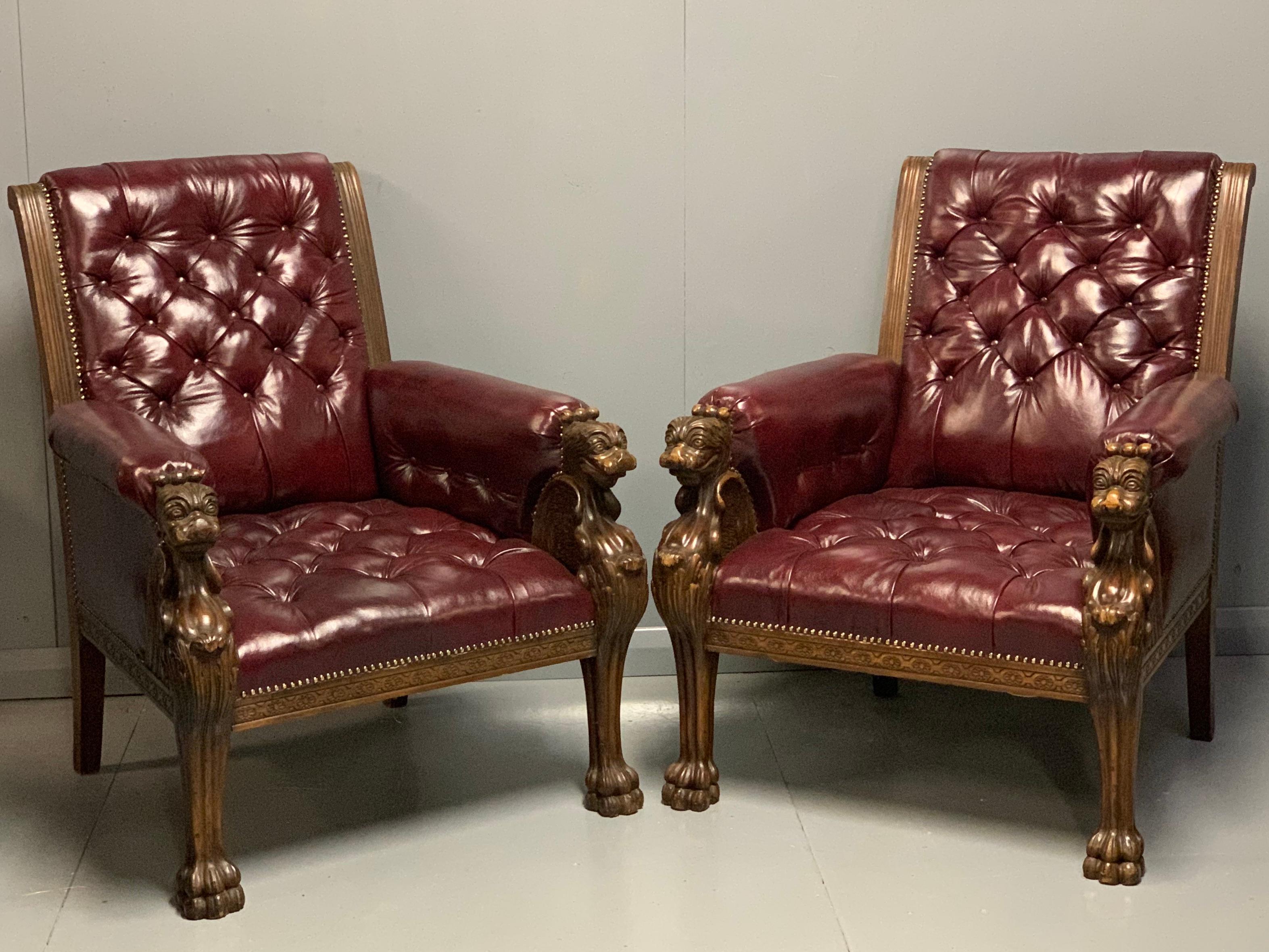 An outstanding and generous size pair of 19th century continental buttoned leather armchairs with Griffin monopodia.
Fabulous condition and the chairs have been completely re upholstered throughout, finished with this stunning rich burgundy leather