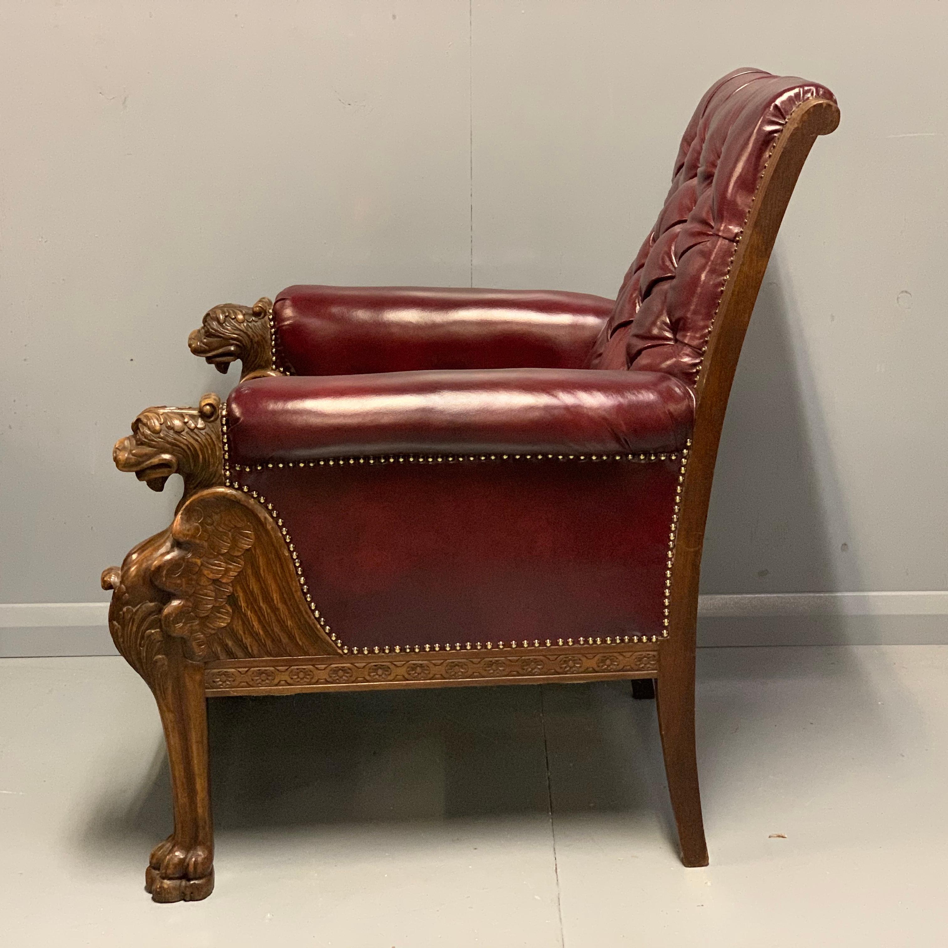 Carved Large Pair of Mid-19th Century European Buttoned Leather Armchairs with Griffins For Sale