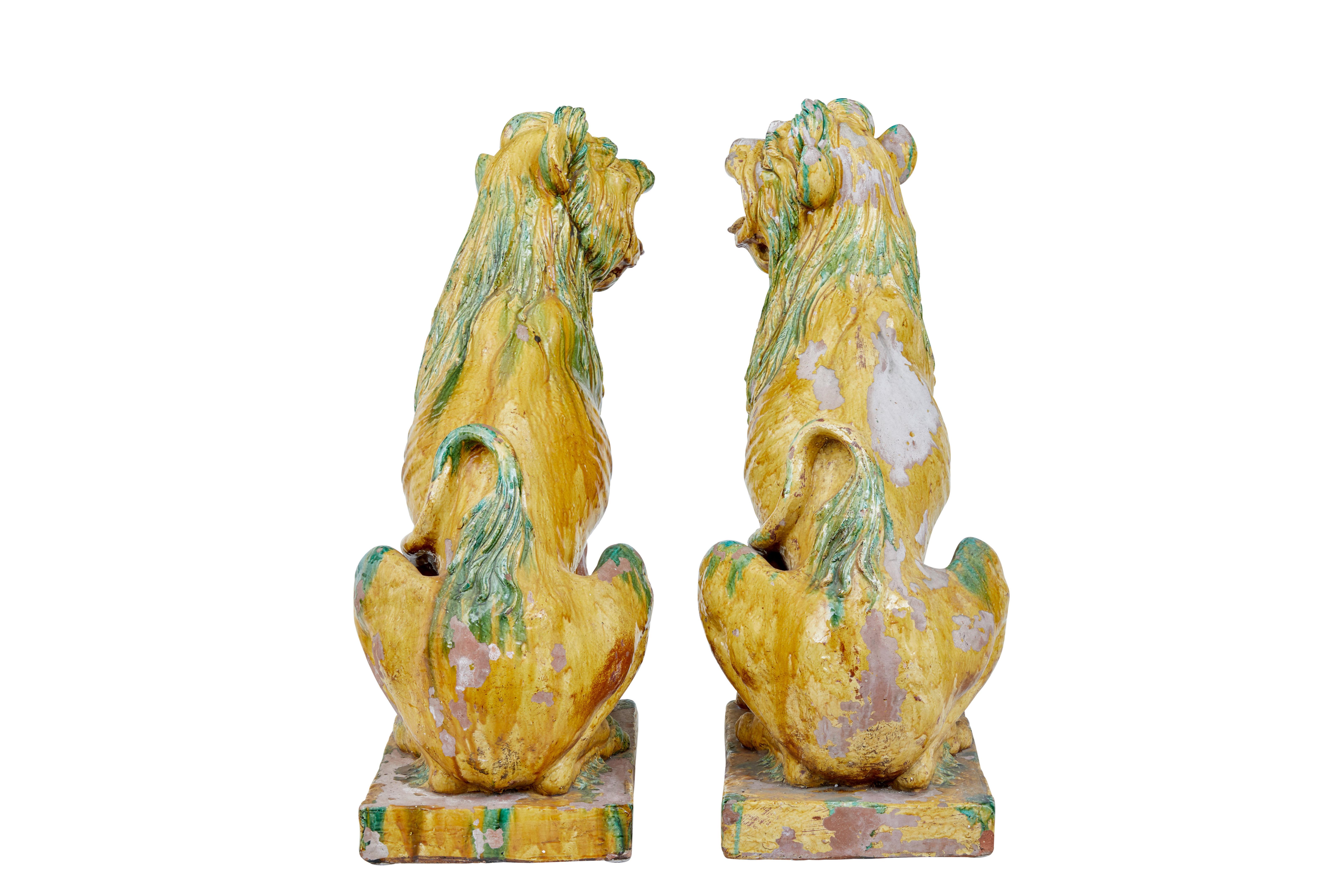 Hand-Crafted Large pair of mid 20th century Indonesian salt glazed decoration dogs For Sale
