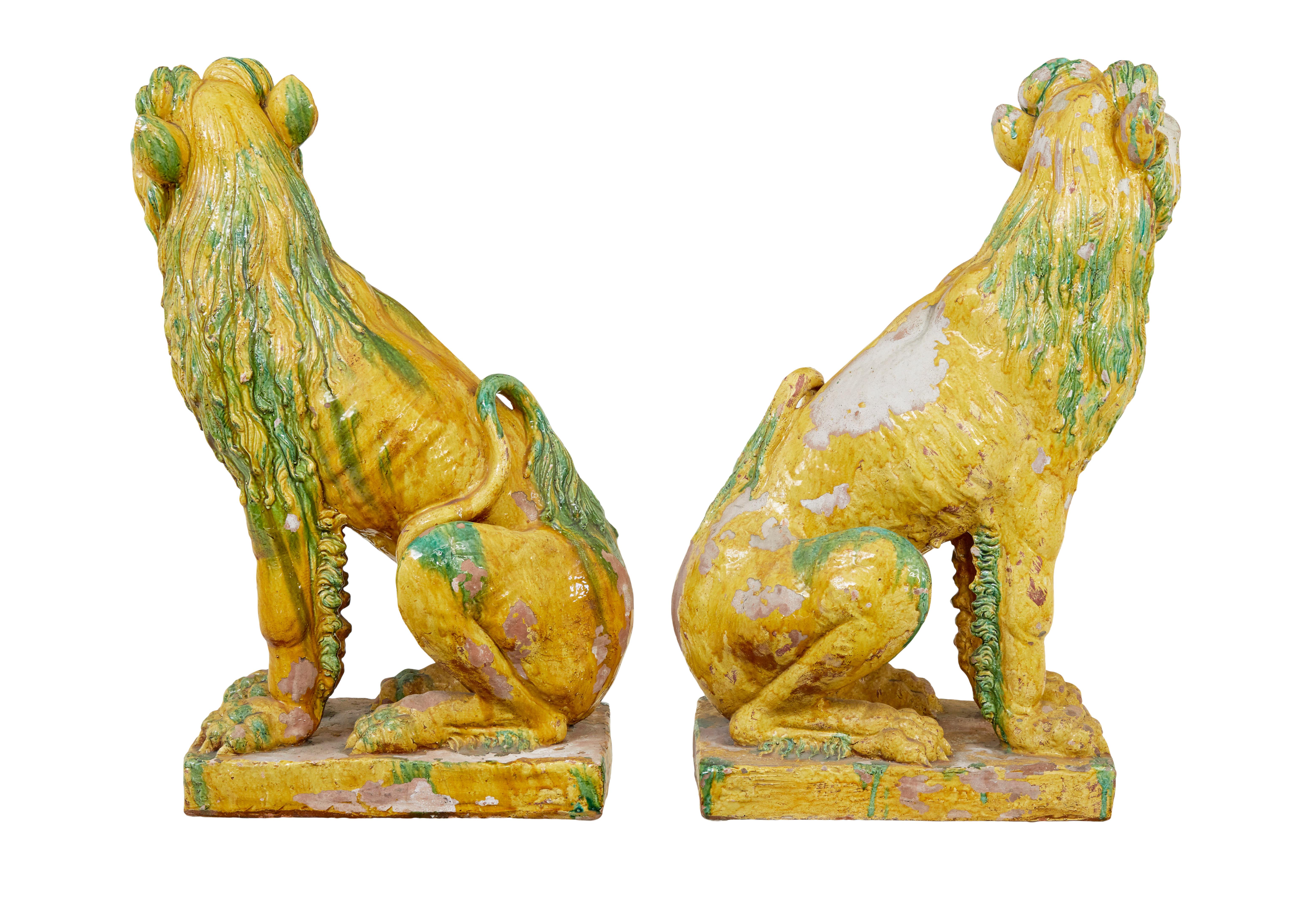 Victorian Large pair of mid 20th century Indonesian salt glazed decorative dogs For Sale